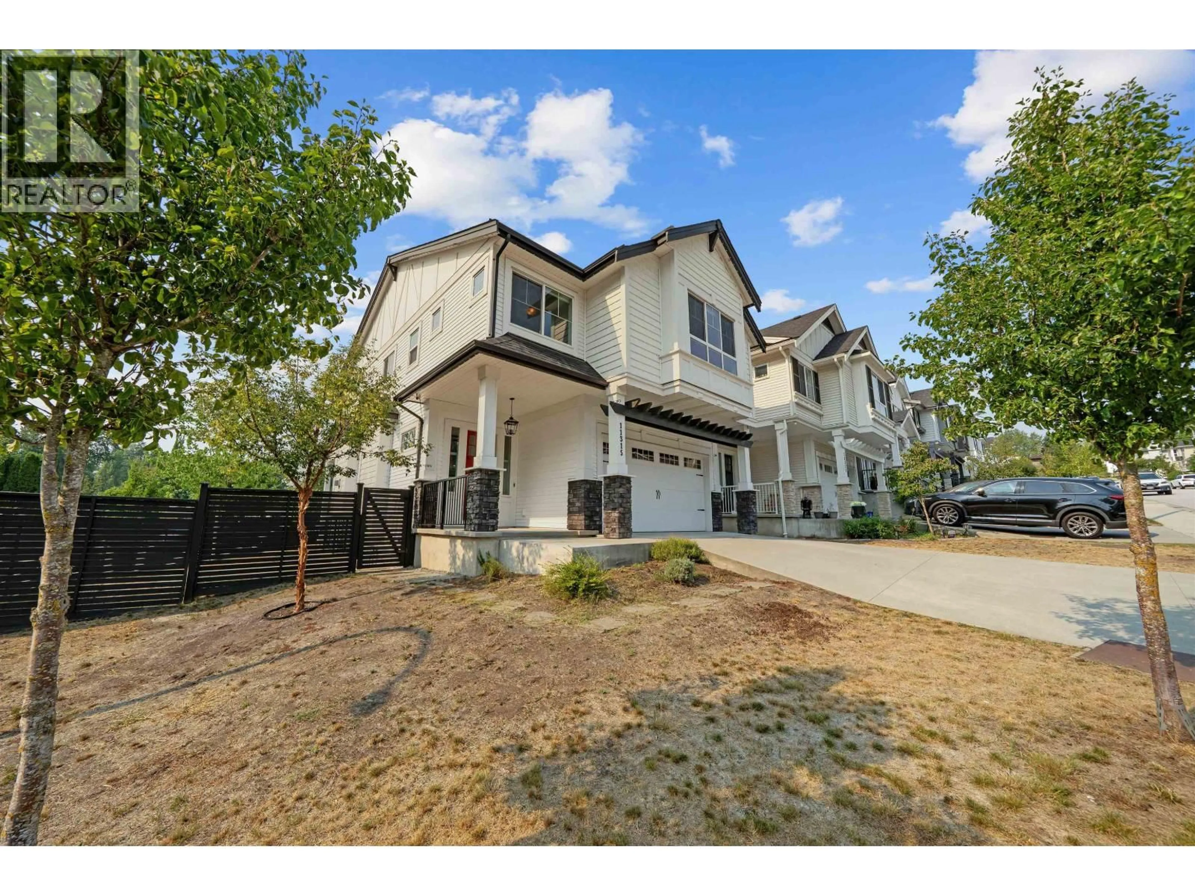 A pic from outside/outdoor area/front of a property/back of a property/a pic from drone, street for 11315 230 STREET, Maple Ridge British Columbia V2X9S6