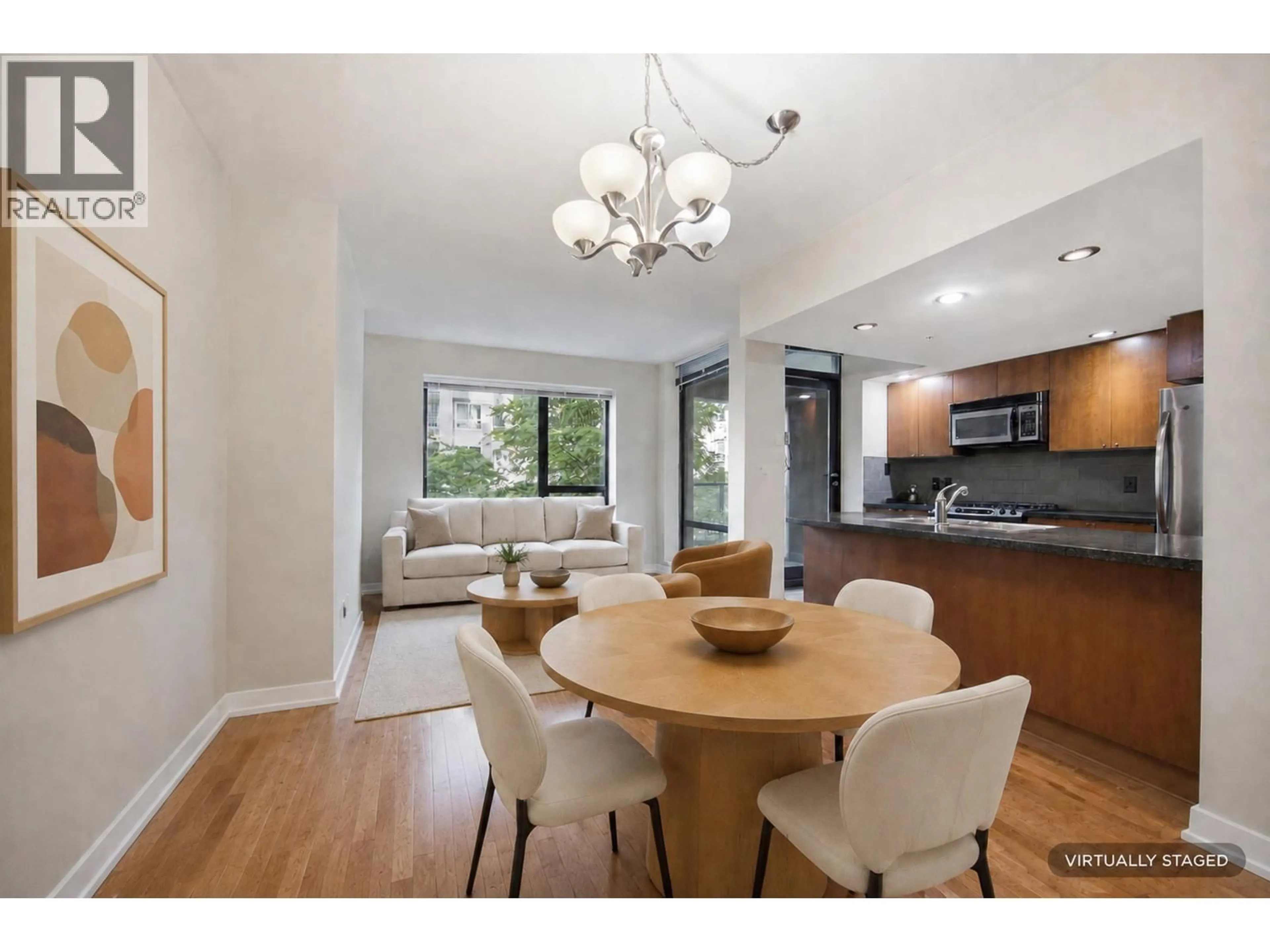 Dining room, wood/laminate floor for 202 - 9180 HEMLOCK DRIVE, Richmond British Columbia V6Y4J5