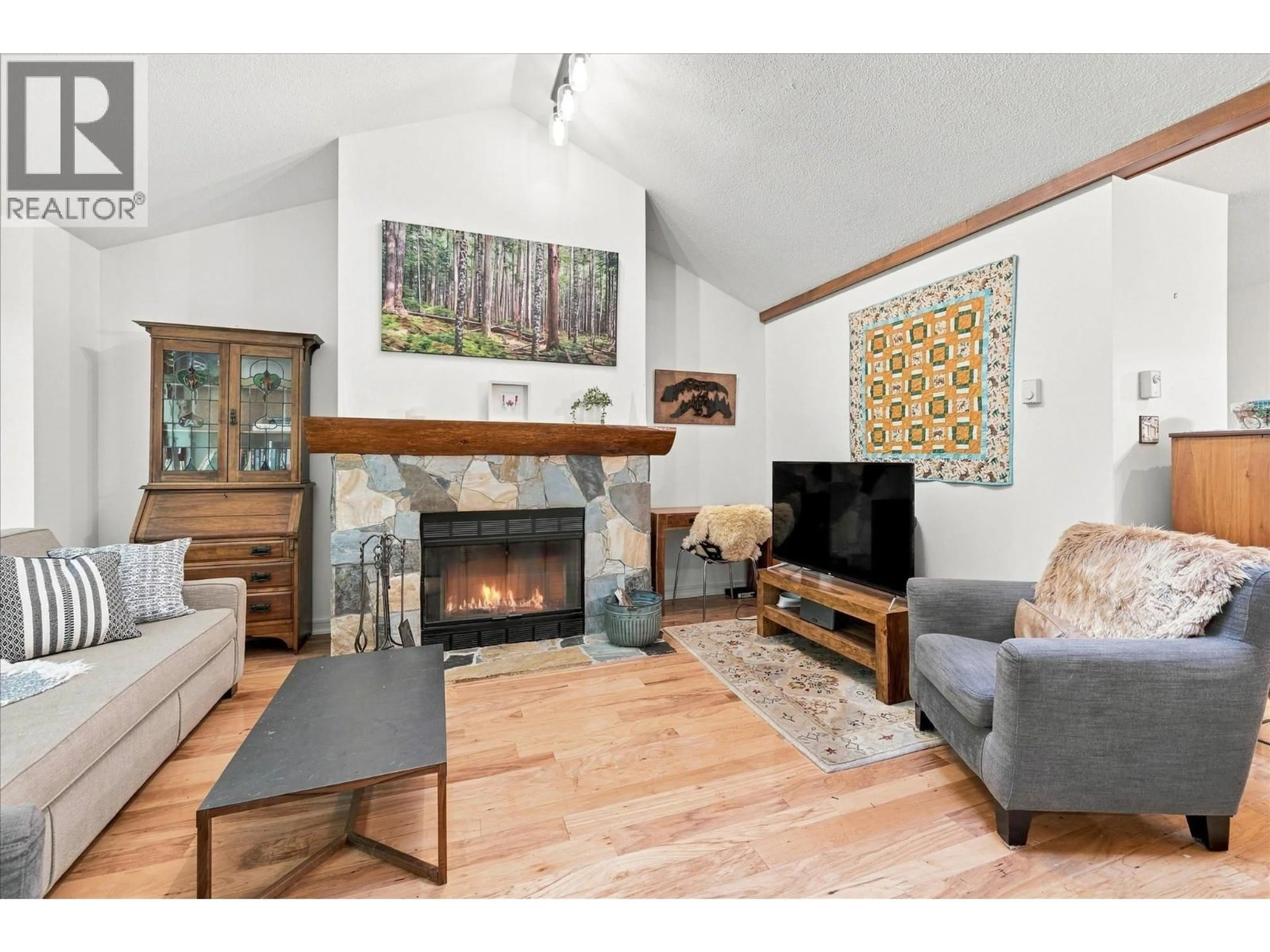 Living room with furniture, wood/laminate floor for 40 - 4652 BLACKCOMB WAY, Whistler British Columbia V8E0X2