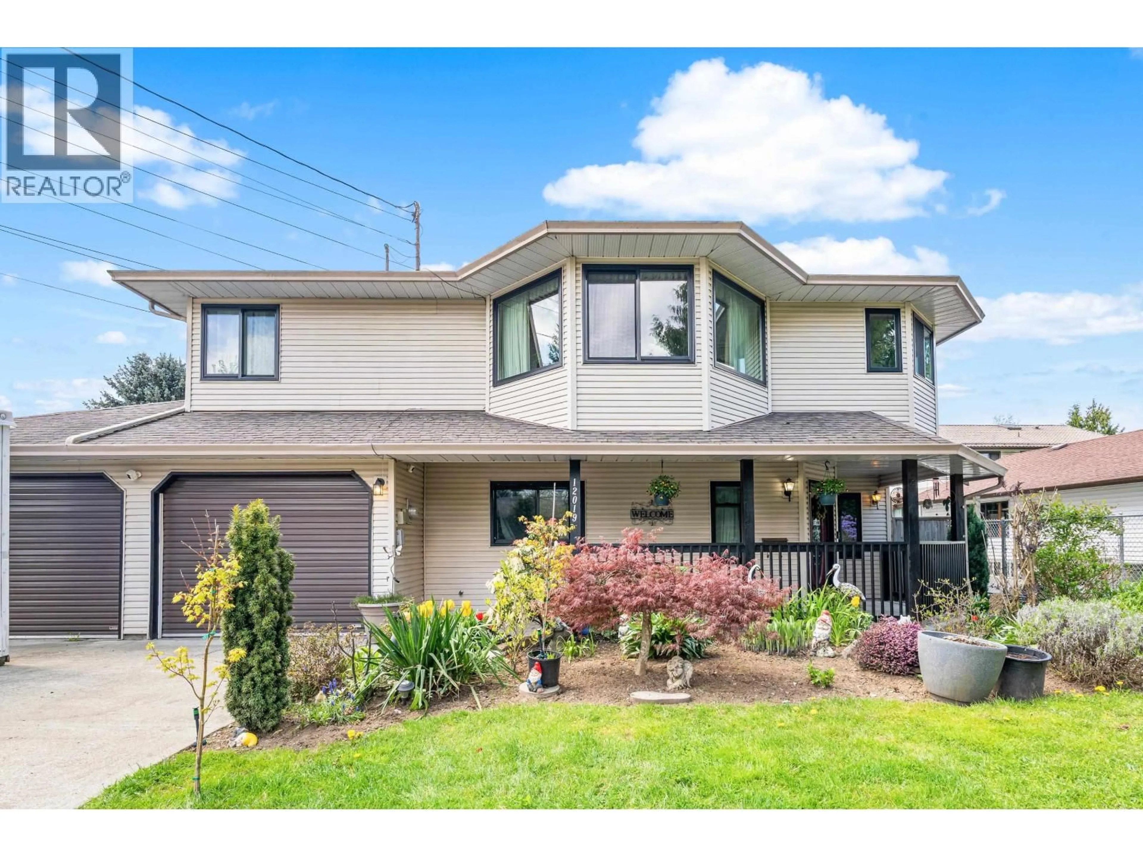 Home with vinyl exterior material, street for 12019 206 STREET, Maple Ridge British Columbia V2X1T8