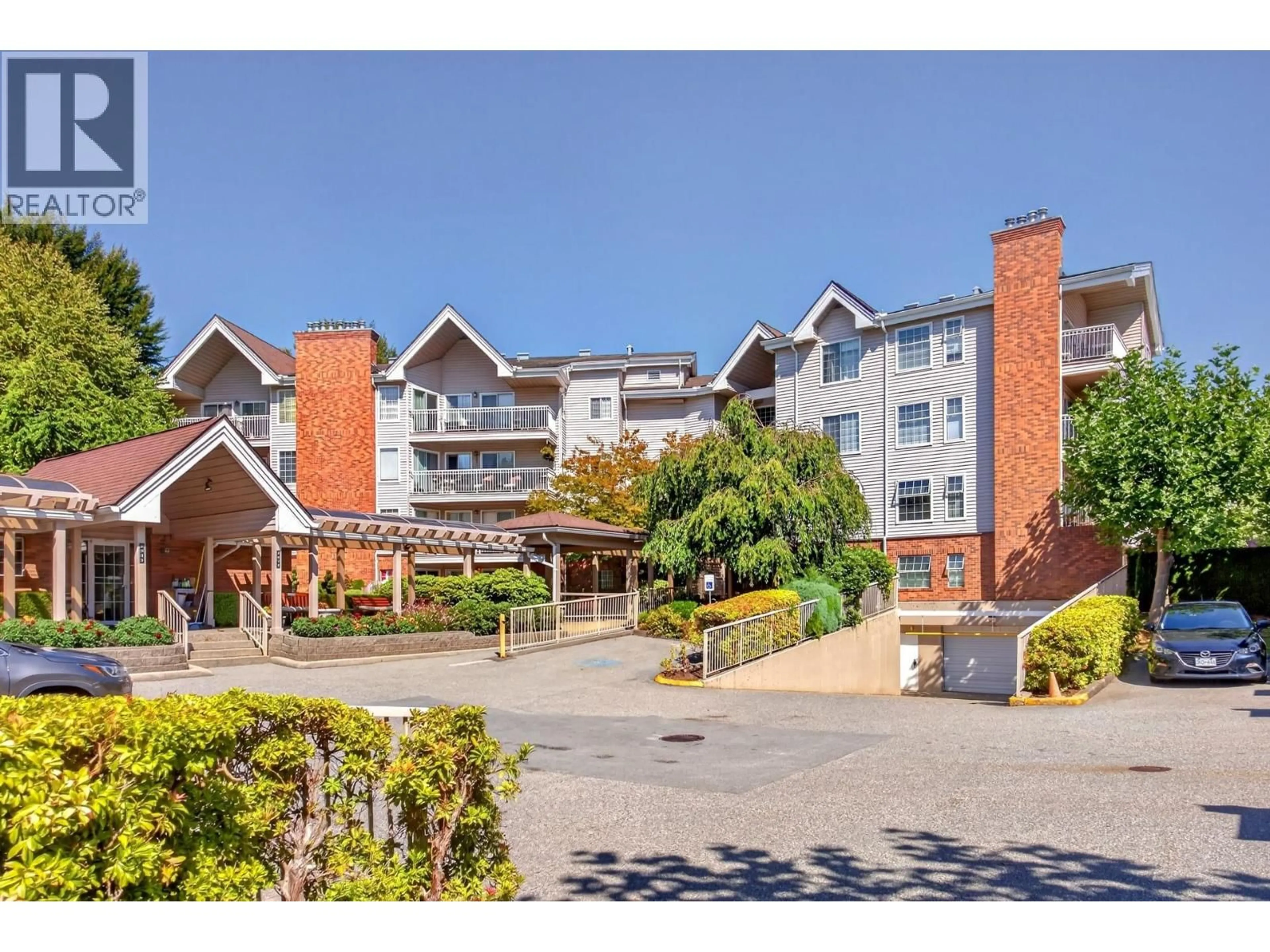 A pic from outside/outdoor area/front of a property/back of a property/a pic from drone, mountain view for 103 - 2973 BURLINGTON DRIVE, Coquitlam British Columbia V3B6X1