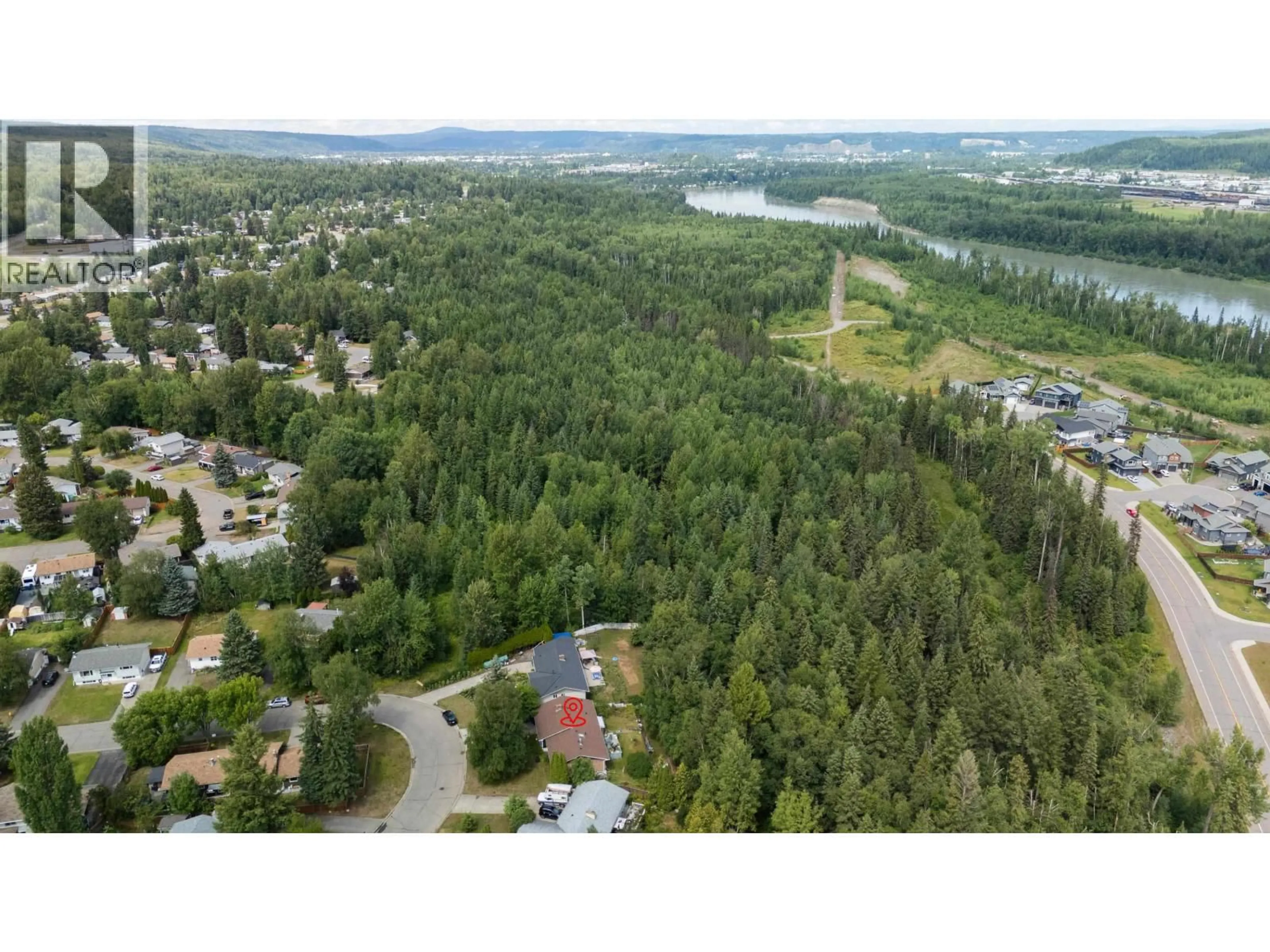 A pic from outside/outdoor area/front of a property/back of a property/a pic from drone, forest/trees view for 7288 IMPERIAL CRESCENT, Prince George British Columbia V2N2W6