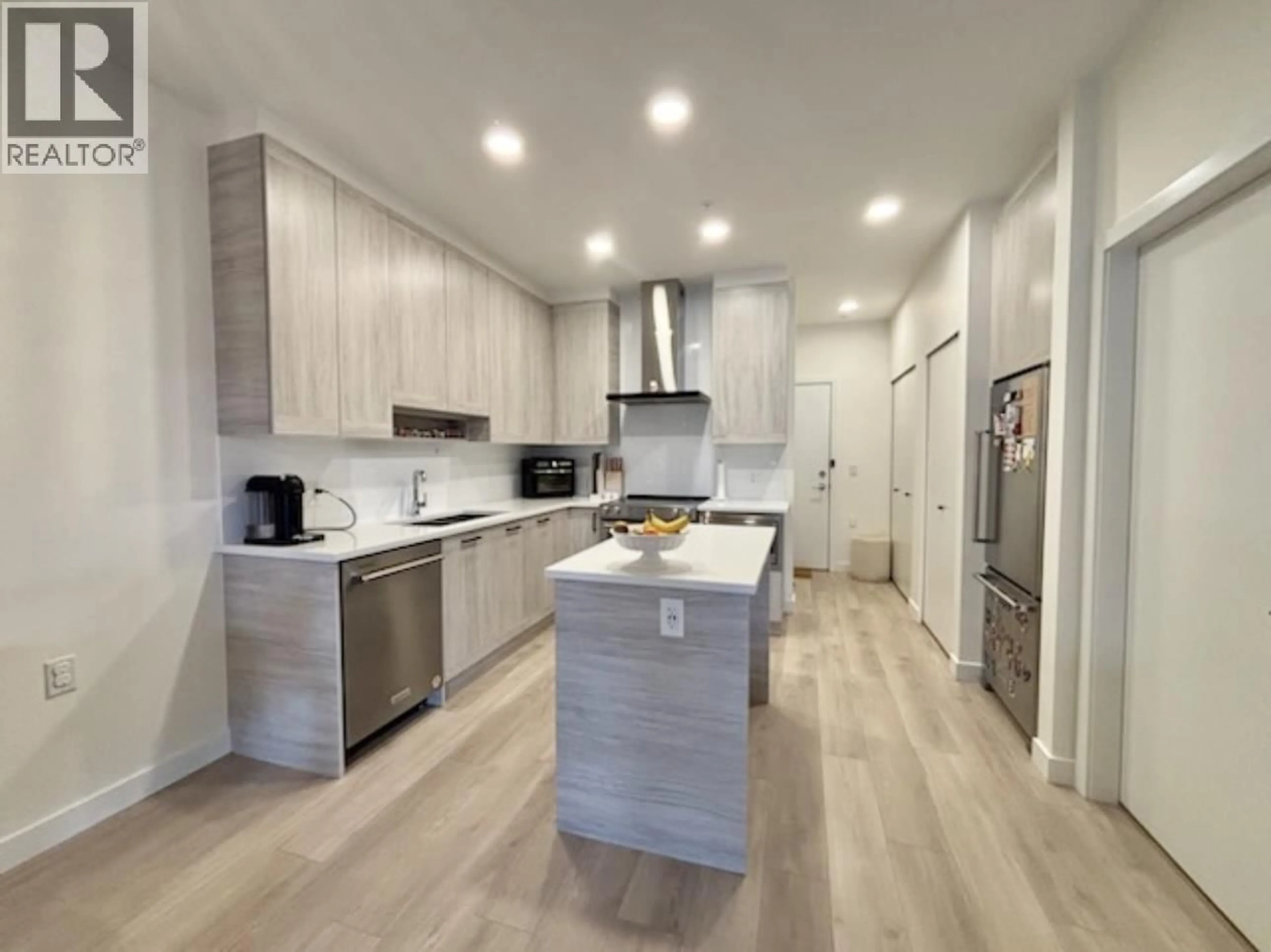 Contemporary kitchen, wood/laminate floor for 317 - 7579 16TH STREET, Burnaby British Columbia V3N0H7
