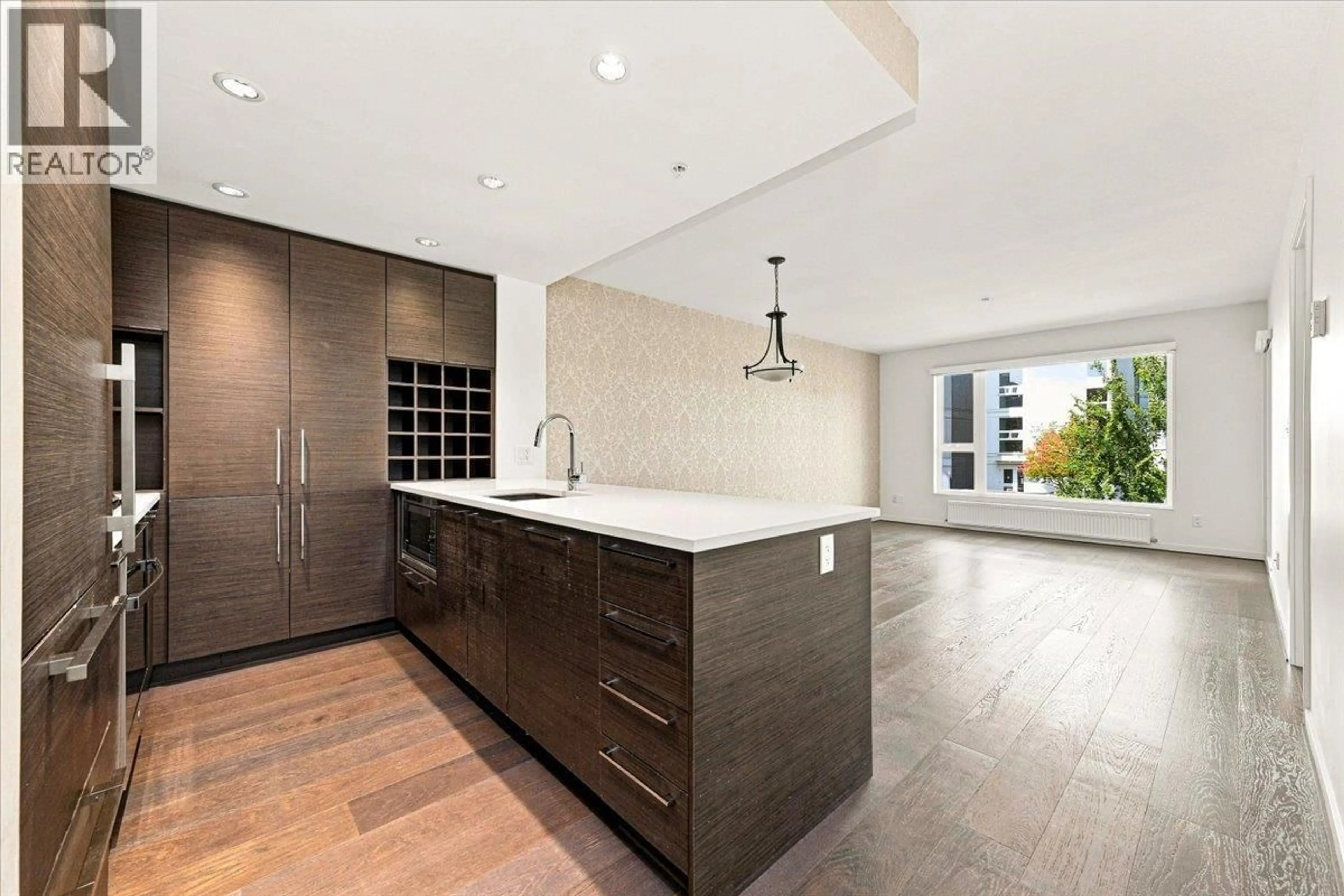 Open concept kitchen, ceramic/tile floor for 619 - 5955 BIRNEY AVENUE, Vancouver British Columbia V6S0C5