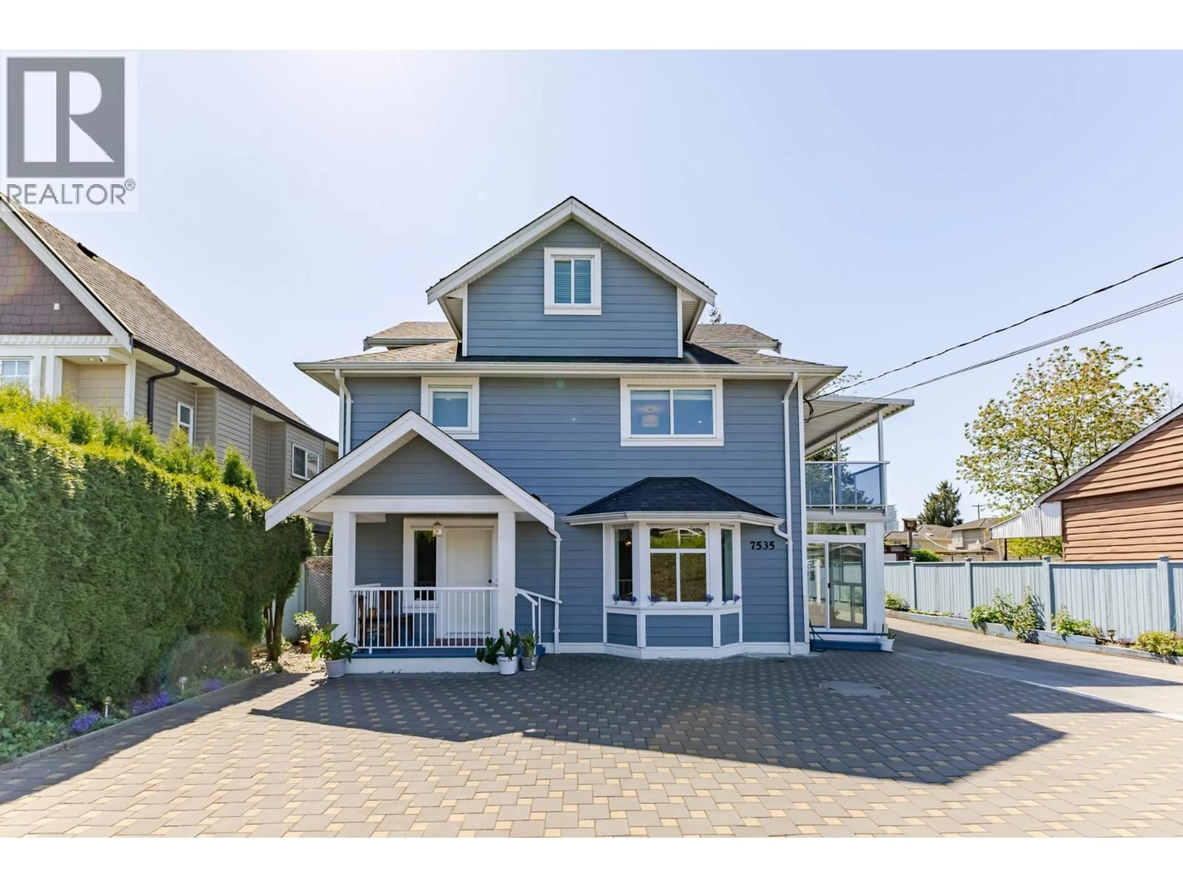 Home with vinyl exterior material, street for 7535 BURGESS STREET, Burnaby British Columbia V3N3H9