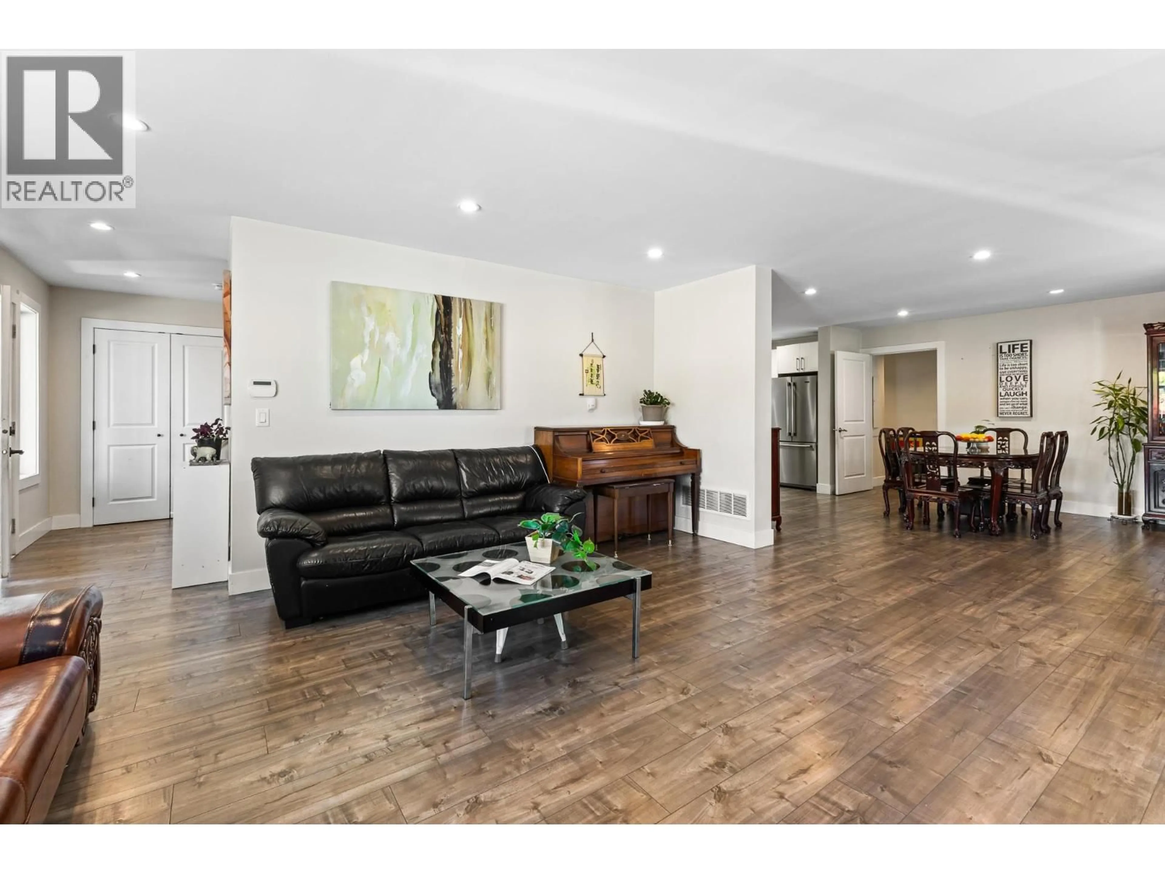 Living room with furniture, wood/laminate floor for 7535 BURGESS STREET, Burnaby British Columbia V3N3H9