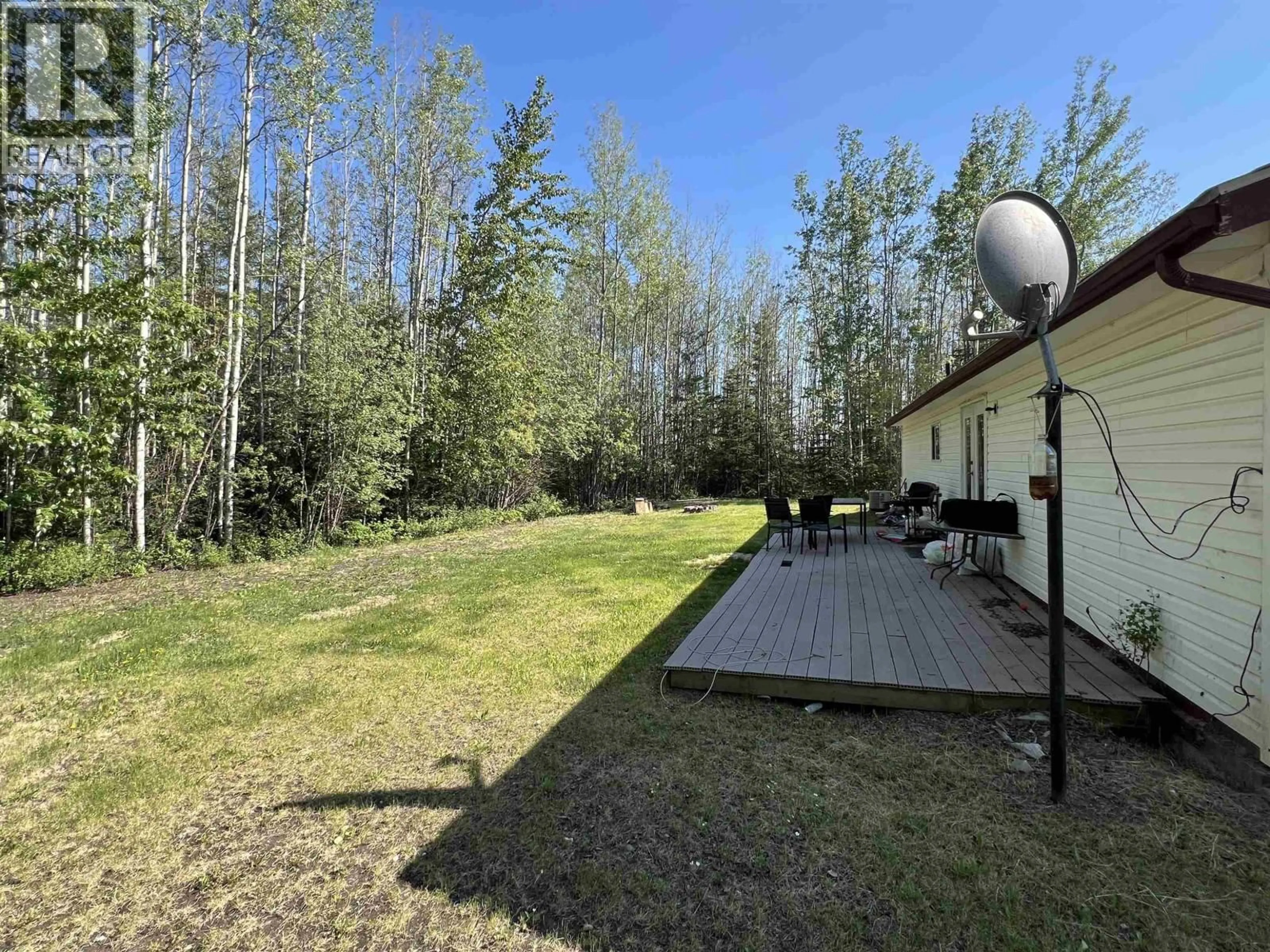 A pic from outside/outdoor area/front of a property/back of a property/a pic from drone, forest/trees view for 6500 OLD ALASKA HIGHWAY, Fort Nelson British Columbia V0C1R0