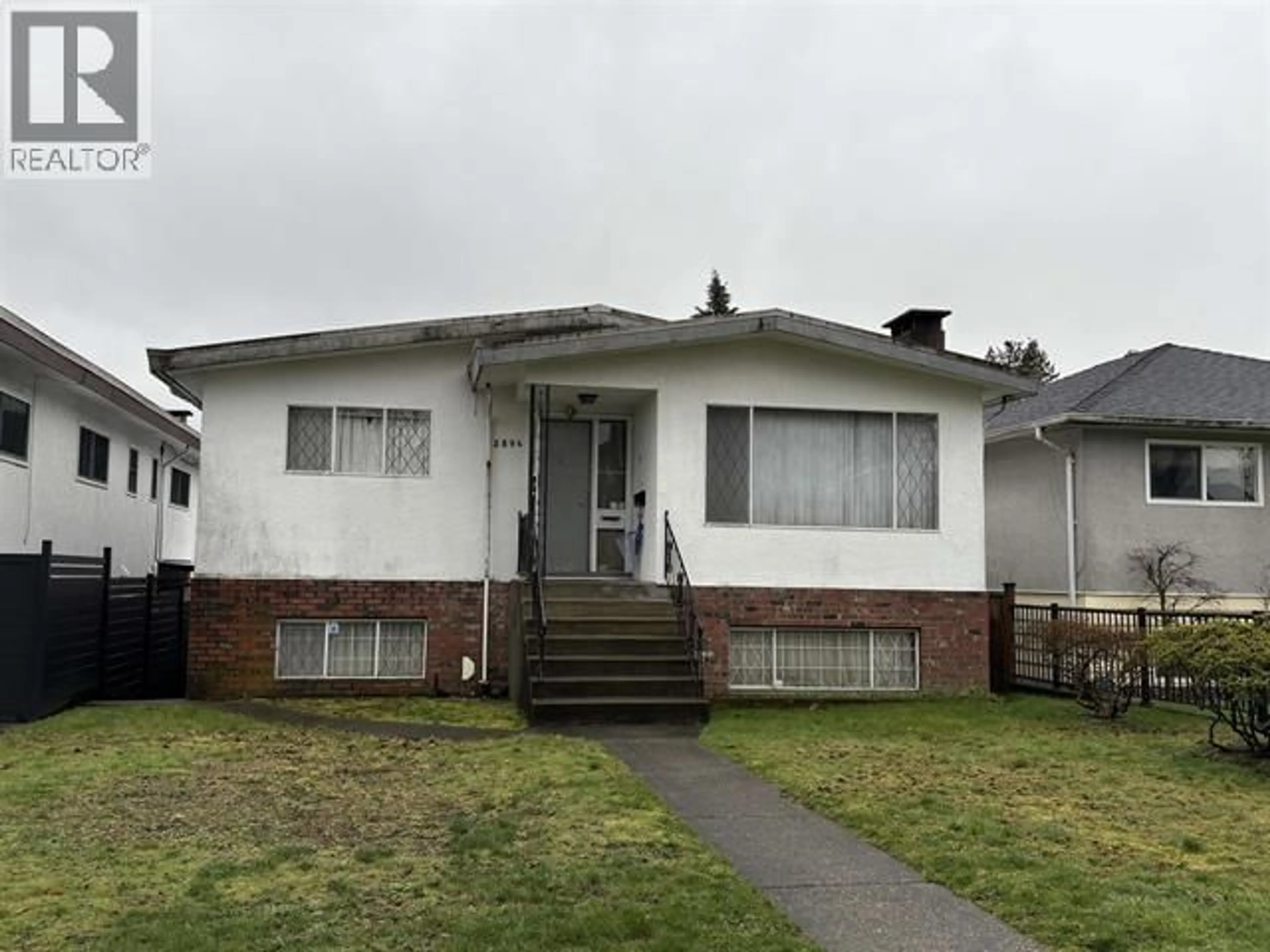 Home with vinyl exterior material, street for 2894 43RD AVENUE, Vancouver British Columbia V5R2Z2