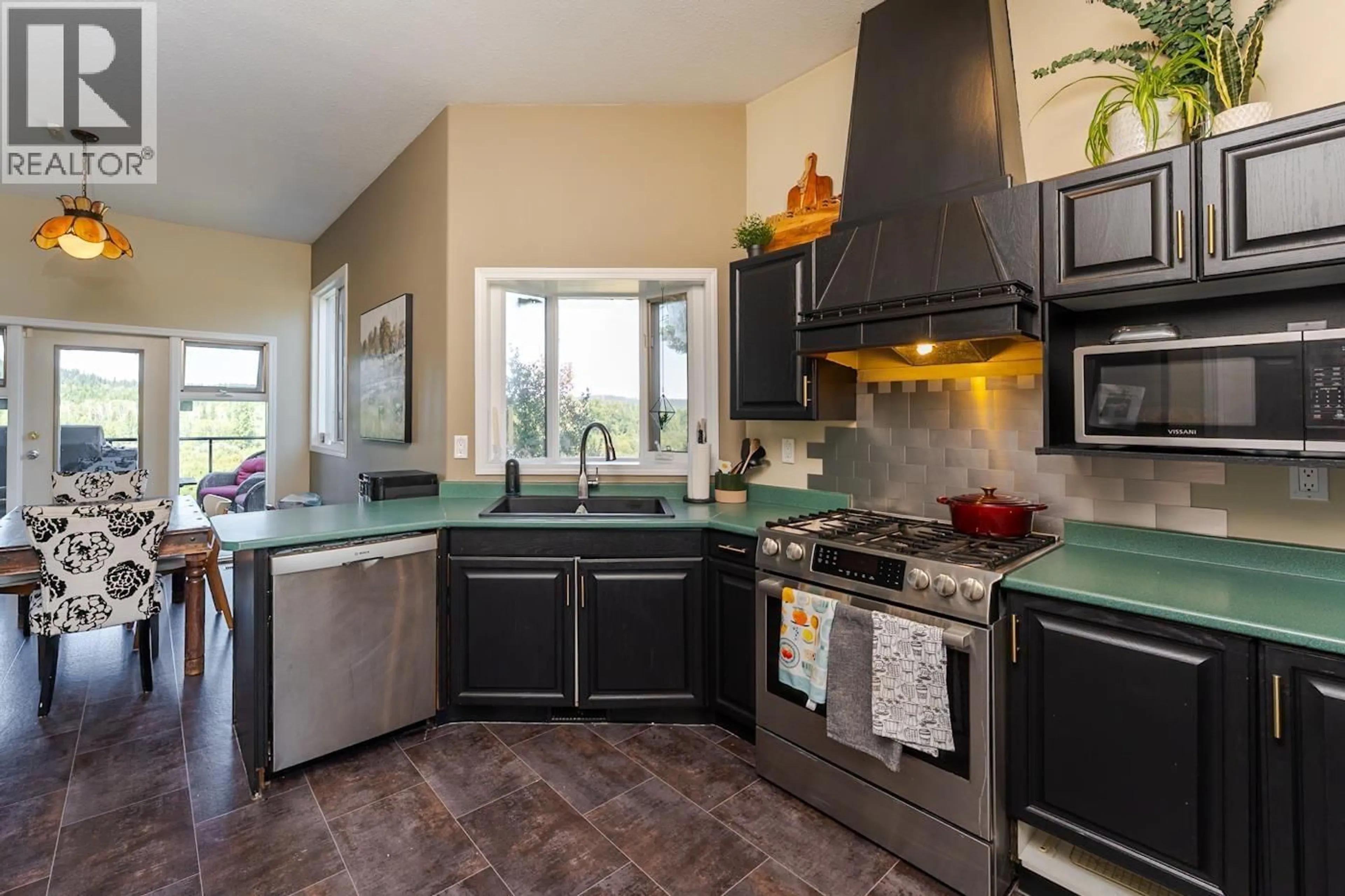 Open concept kitchen, ceramic/tile floor for 1465 BANKS ROAD, Prince George British Columbia V2M7C1