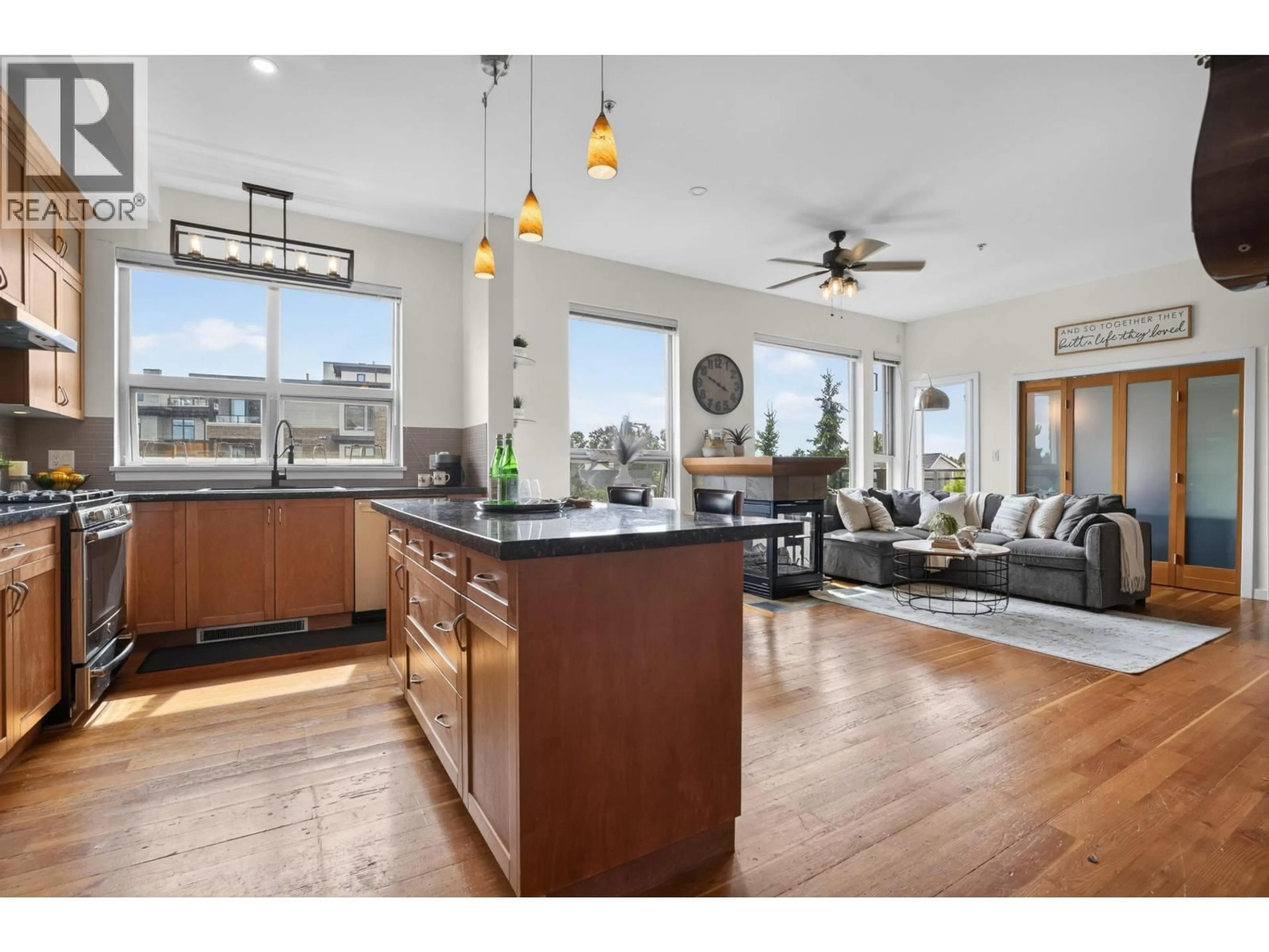 Open concept kitchen, wood/laminate floor for 310 - 250 SALTER STREET, New Westminster British Columbia V3M0B7