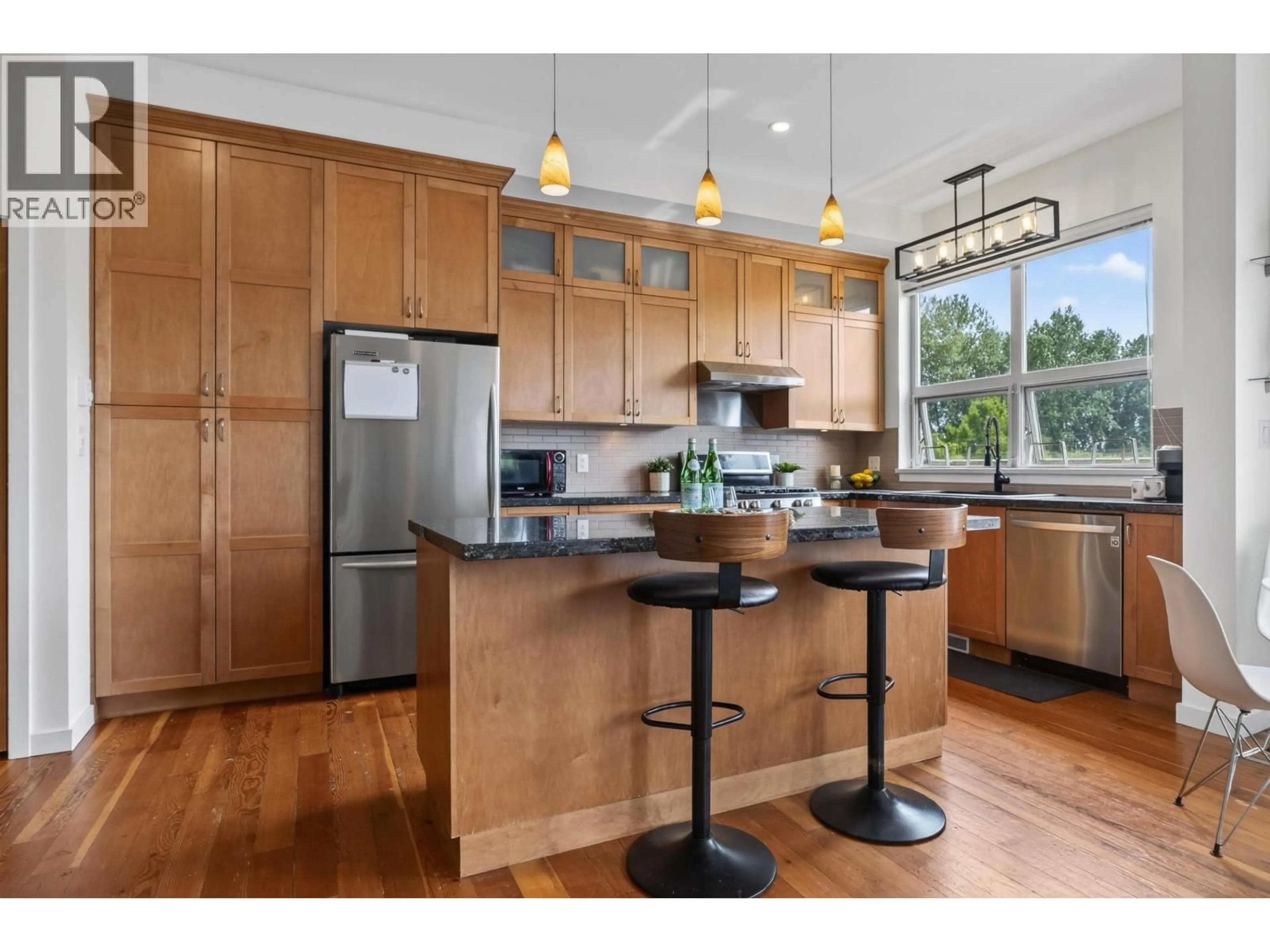 Open concept kitchen, wood/laminate floor for 310 - 250 SALTER STREET, New Westminster British Columbia V3M0B7