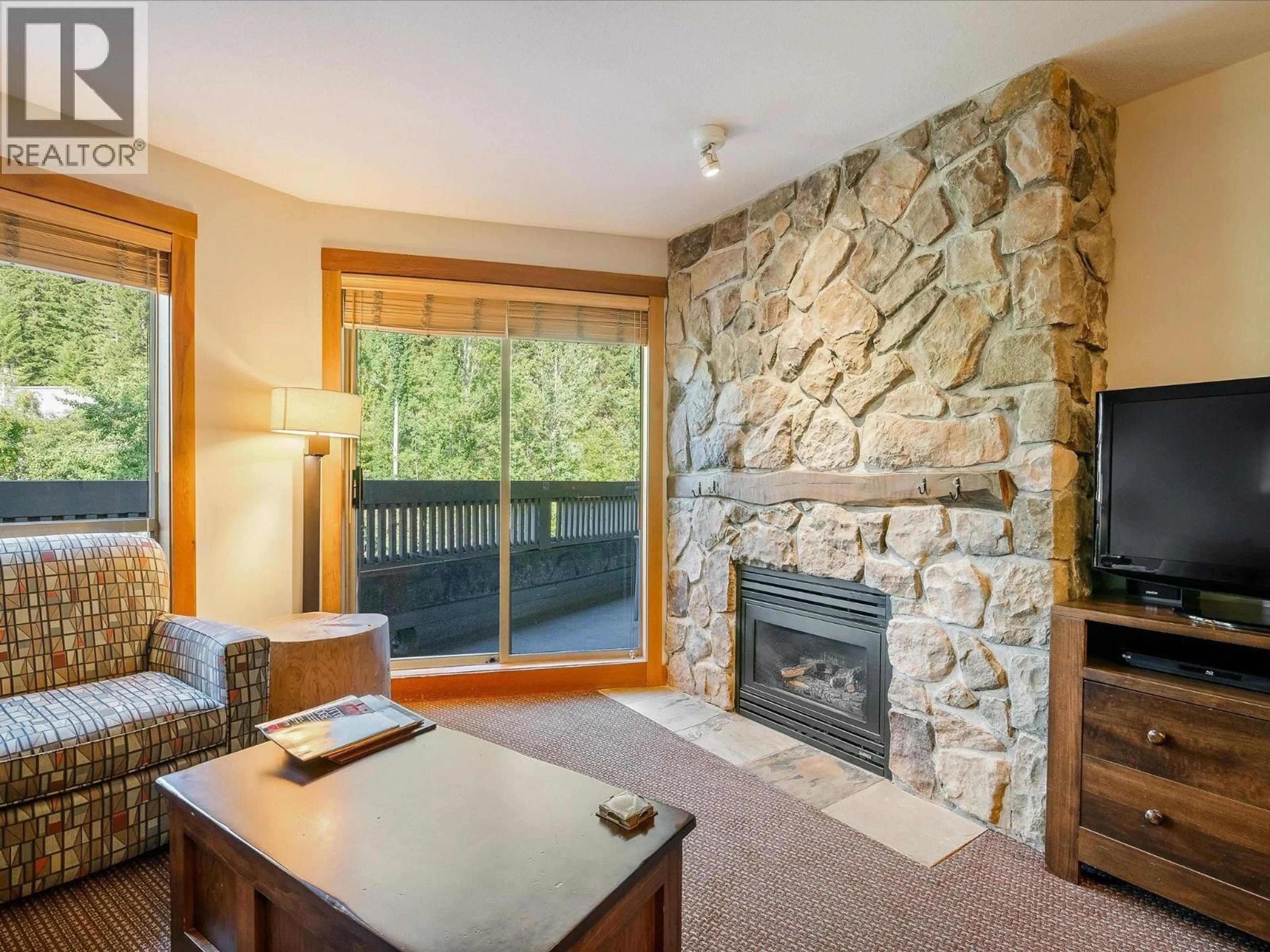 Living room with furniture, unknown for 216A - 2036 LONDON LANE, Whistler British Columbia V8E0N7