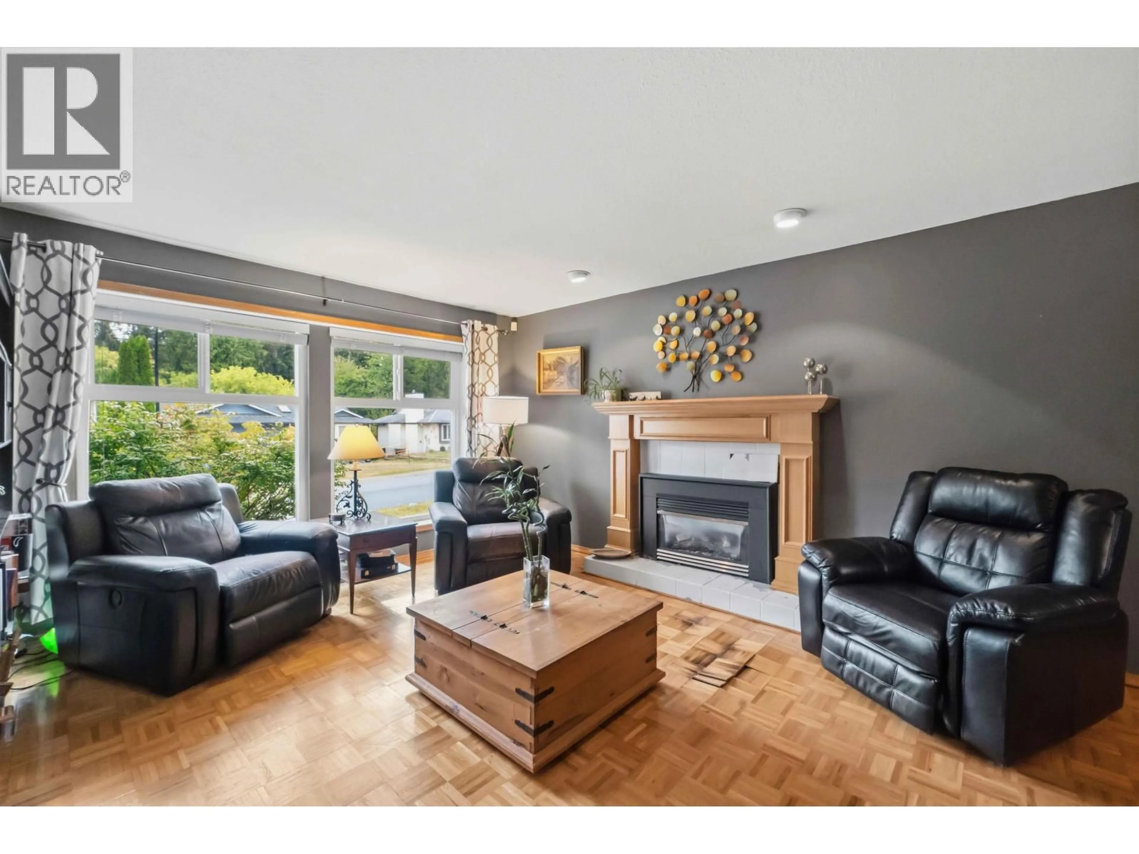 Living room with furniture, wood/laminate floor for 22950 126 AVENUE, Maple Ridge British Columbia V2X0S7