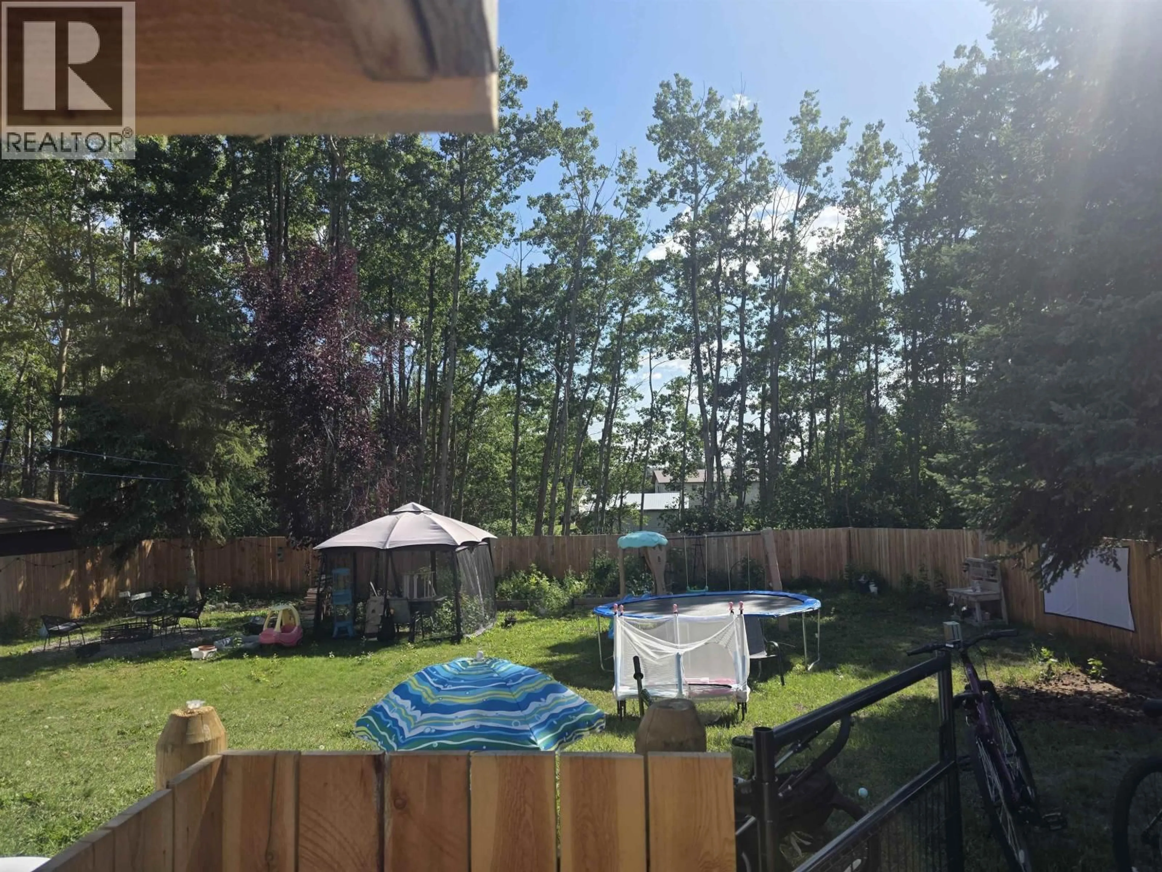 Patio, forest/trees view for 332 VANDERVIEW DRIVE, Vanderhoof British Columbia V0J3A2