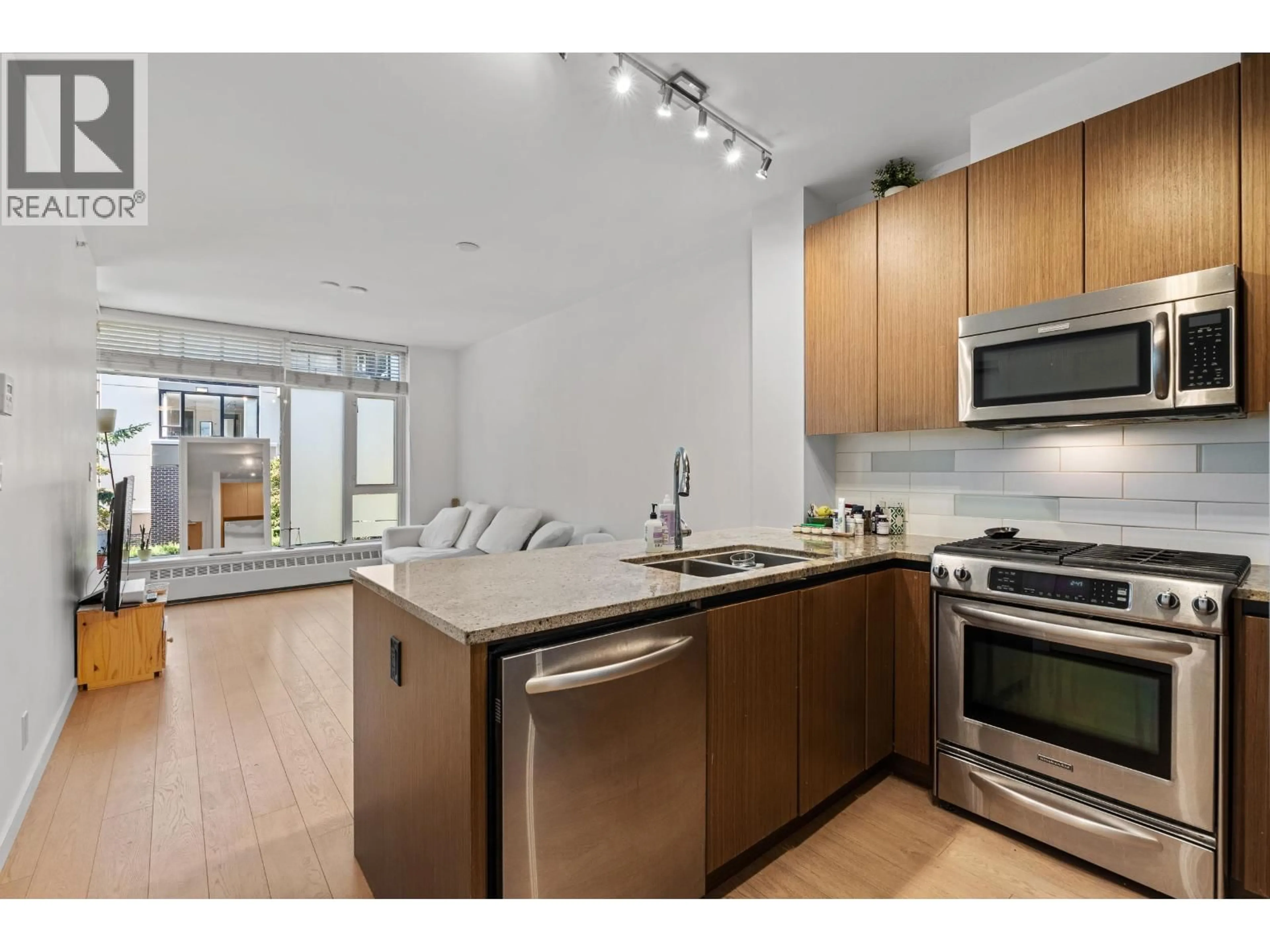 Open concept kitchen, unknown for 205 - 135 2ND STREET, North Vancouver British Columbia V7M0C5