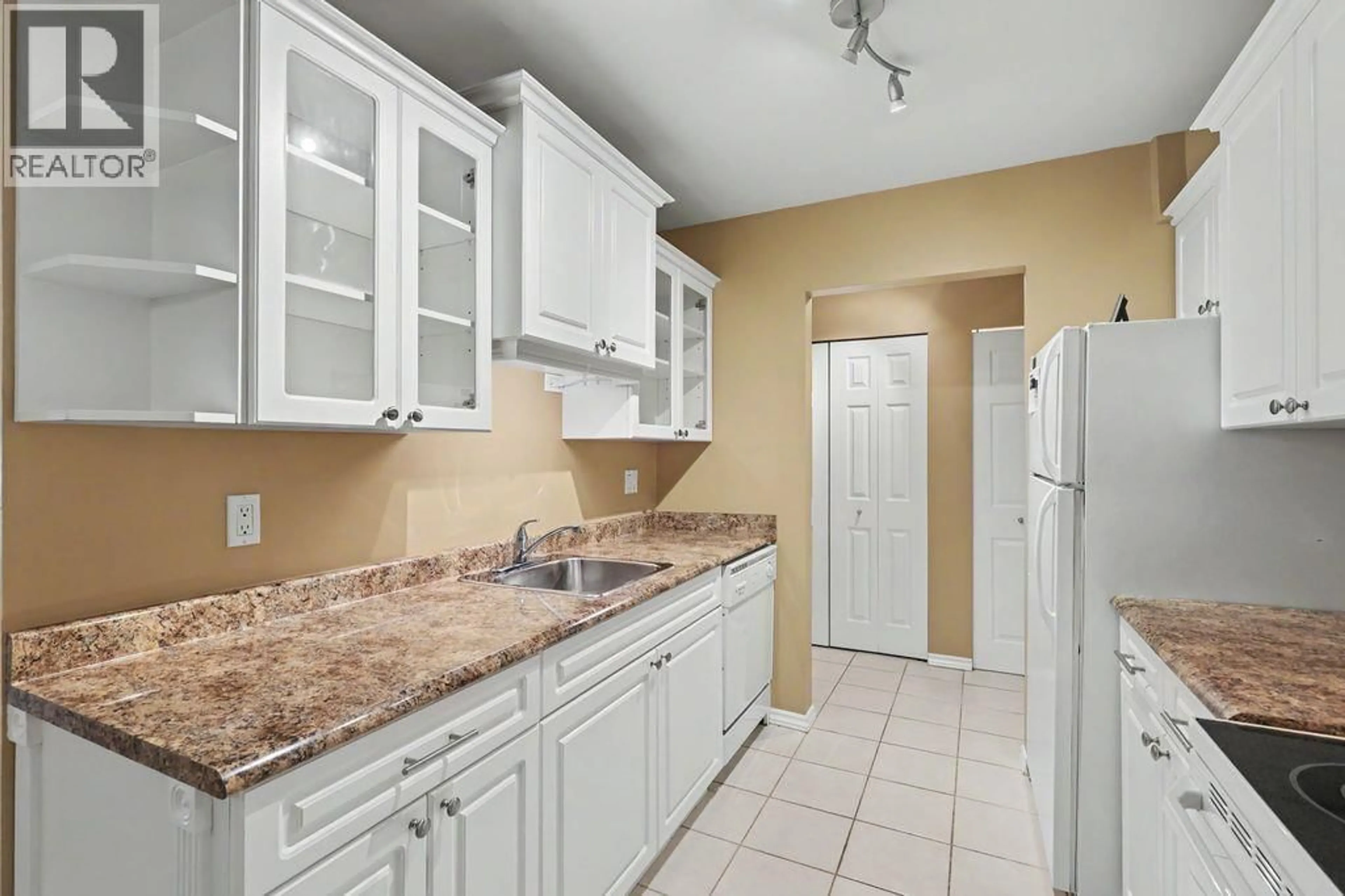 Standard kitchen, ceramic/tile floor for 404 - 1210 PACIFIC STREET, Coquitlam British Columbia V3B6K3