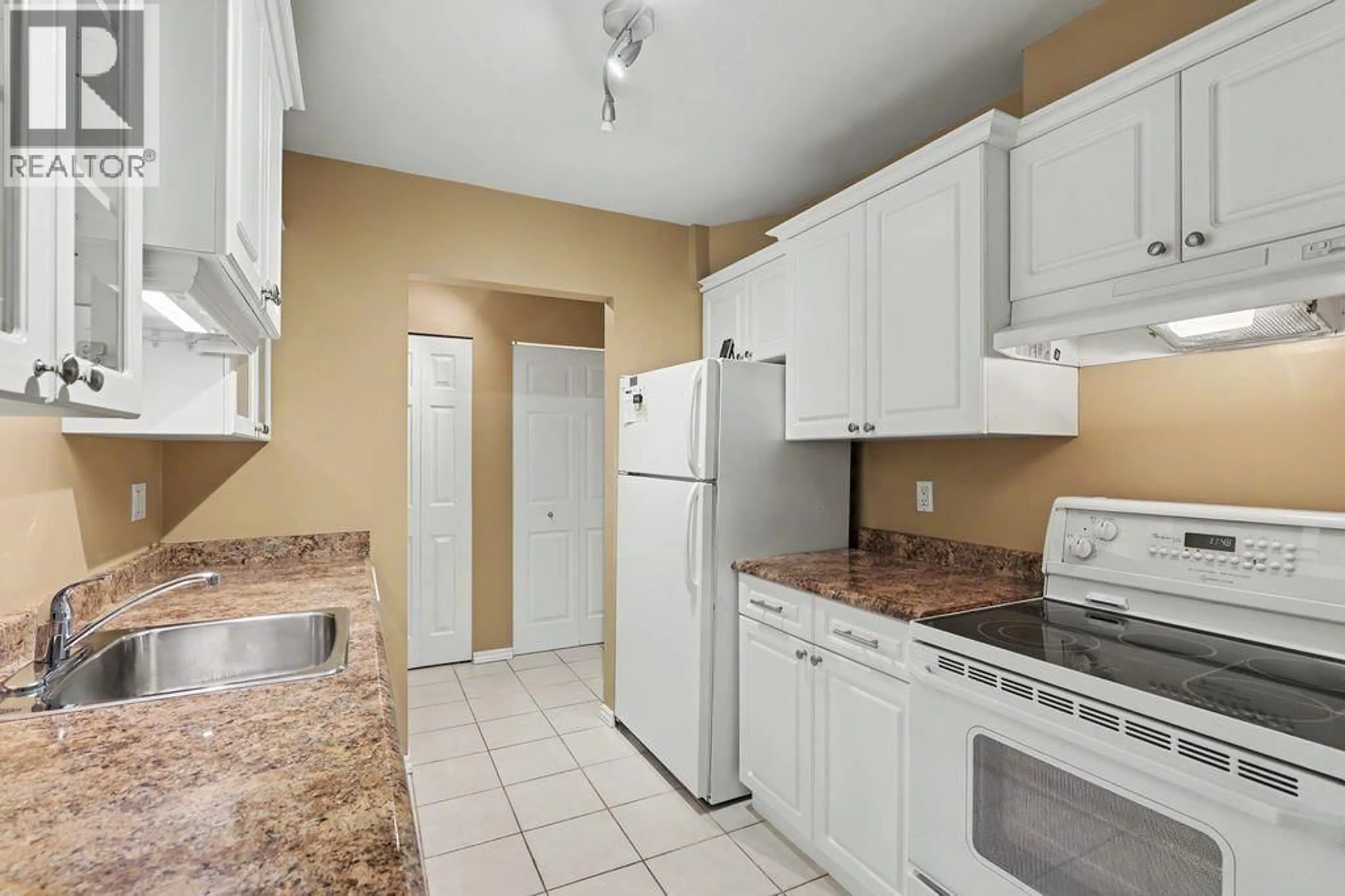 Standard kitchen, ceramic/tile floor for 404 - 1210 PACIFIC STREET, Coquitlam British Columbia V3B6K3