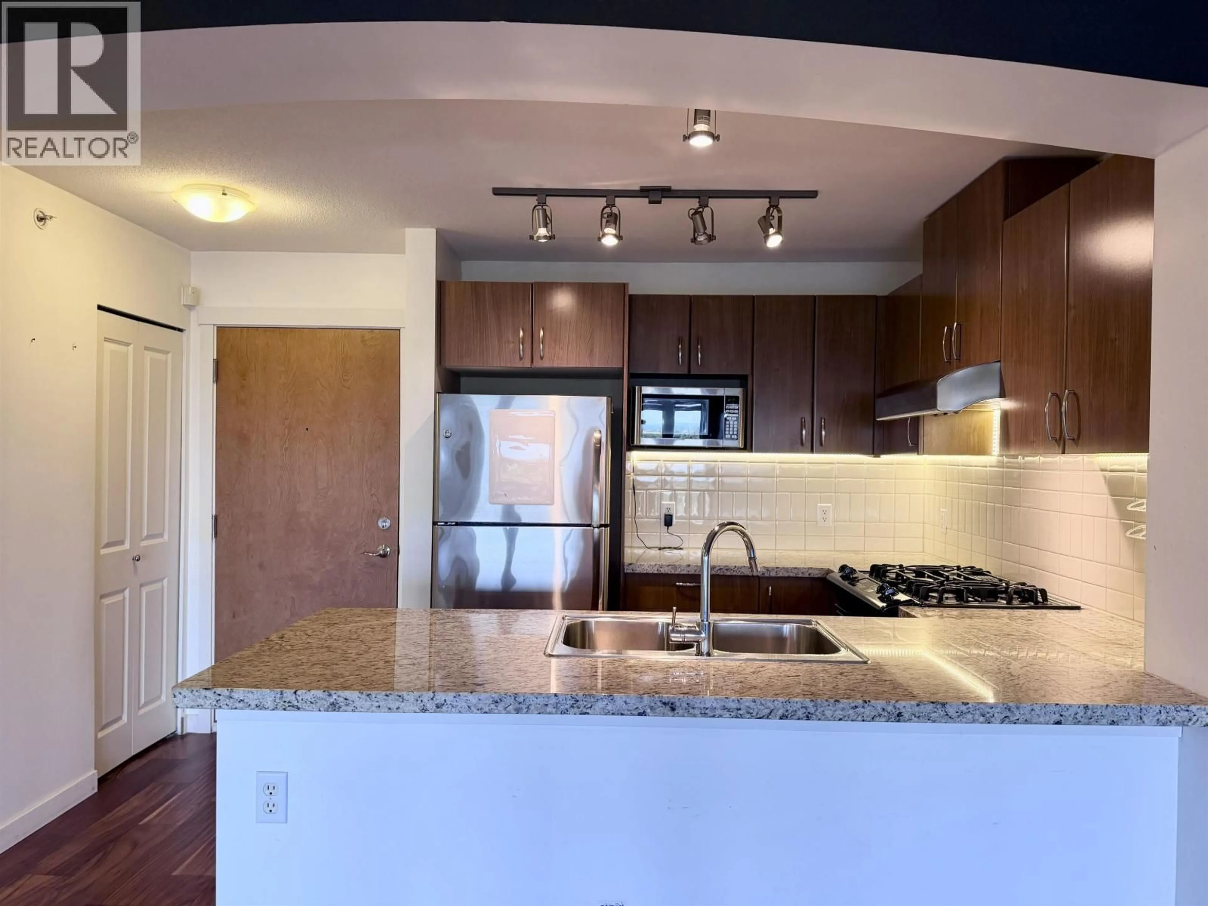 Open concept kitchen, unknown for 402 - 3082 DAYANEE SPRINGS BOULEVARD, Coquitlam British Columbia V3E0A3