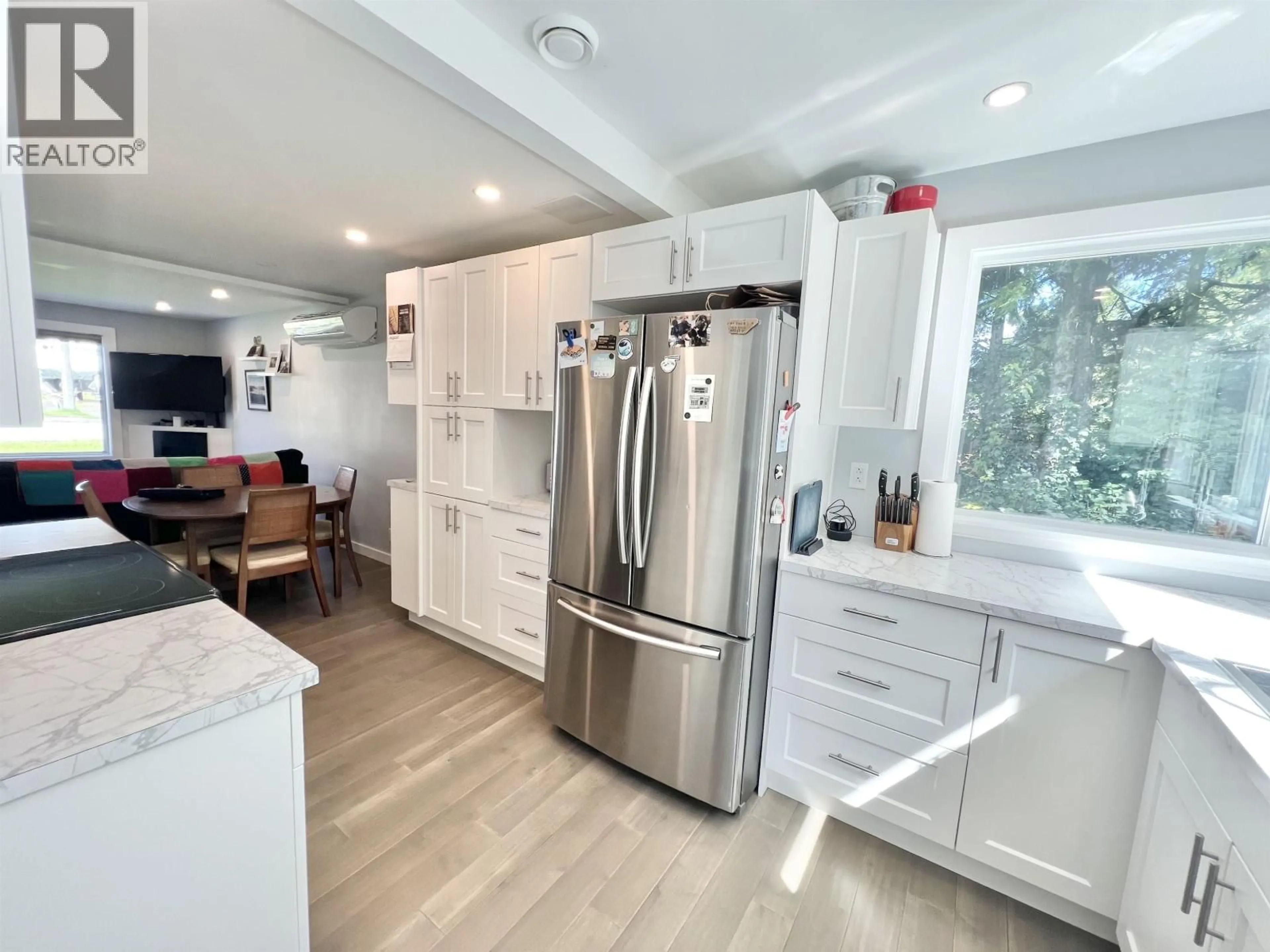 Open concept kitchen, wood/laminate floor for 1244 8TH AVENUE, Prince Rupert British Columbia V8J2N7