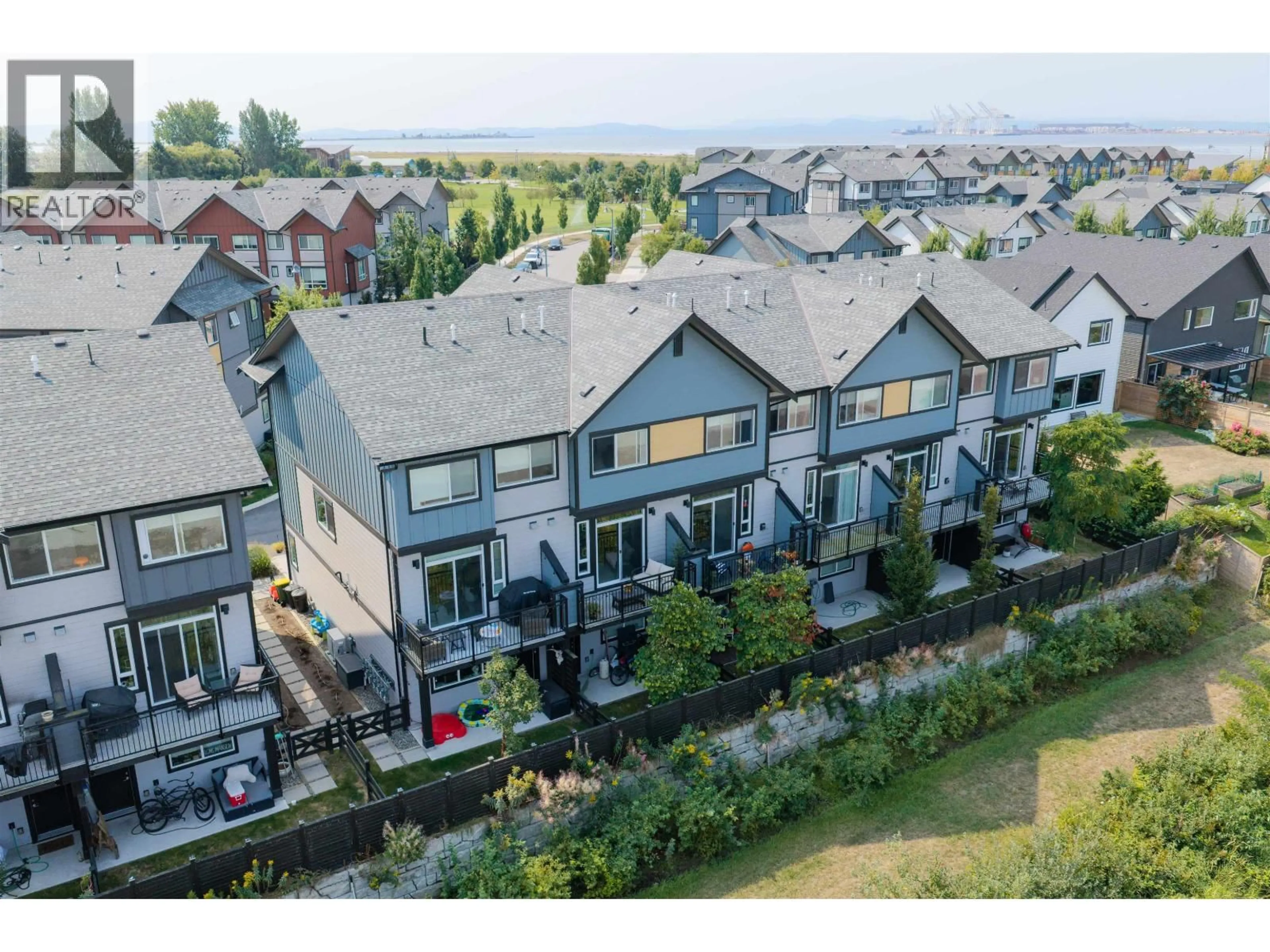 A pic from outside/outdoor area/front of a property/back of a property/a pic from drone, mountain view for 32 - 4375 CORMORANT WAY, Delta British Columbia V4M0G3