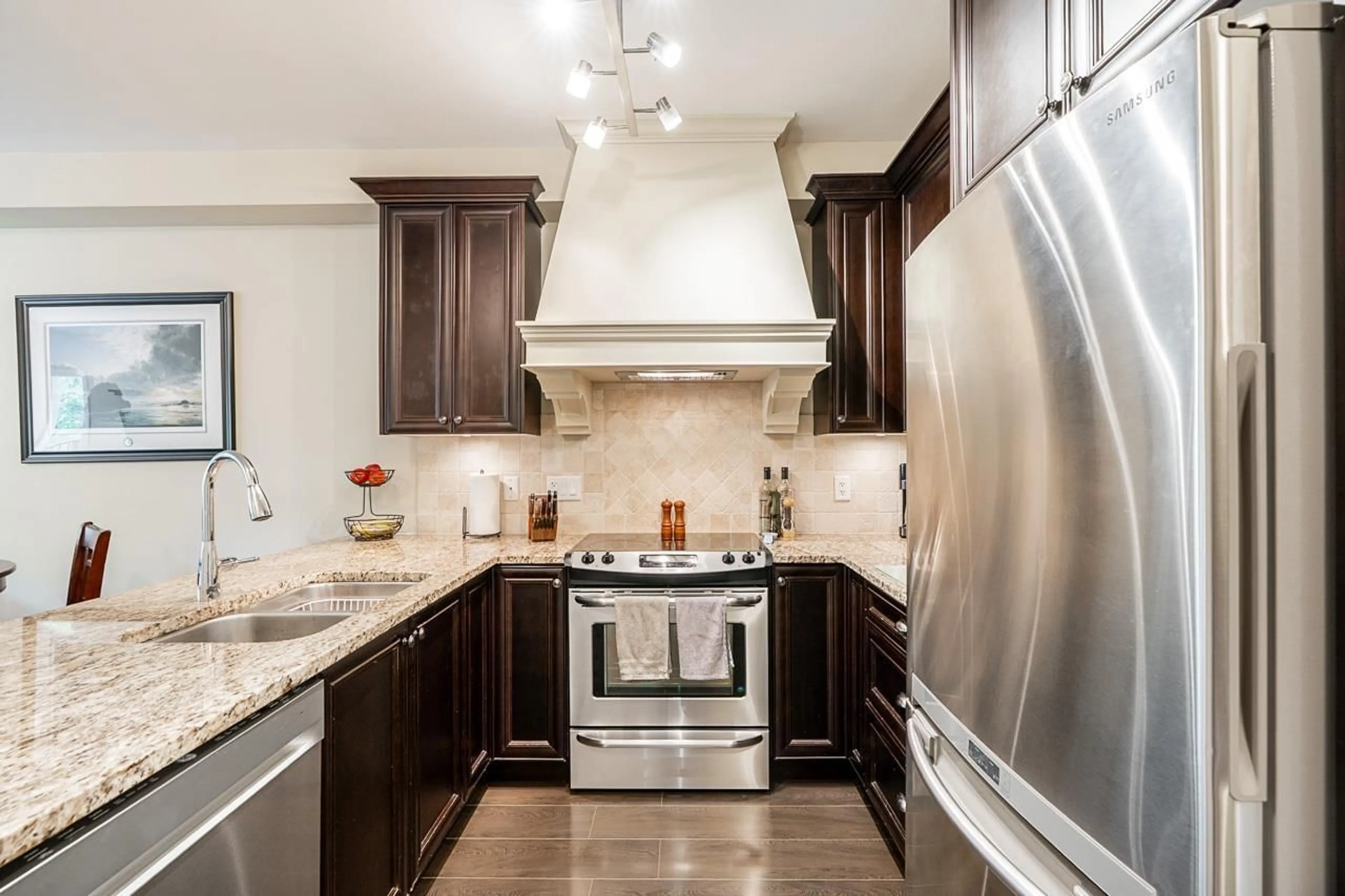Contemporary kitchen, ceramic/tile floor for 401 - 6480 195A STREET, Surrey British Columbia V4N6P1