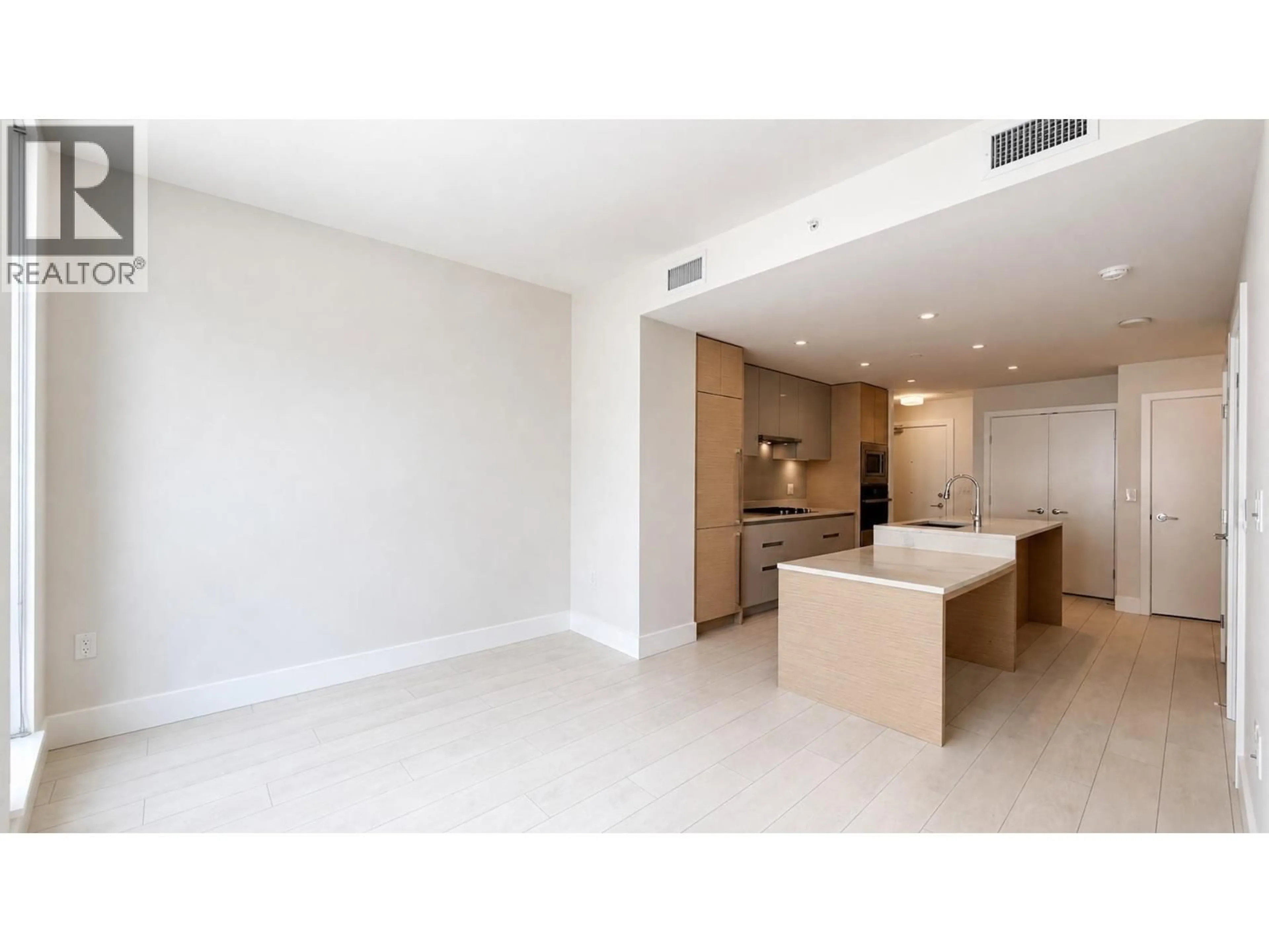 Open concept kitchen, unknown for 405 - 3538 SAWMILL CRESCENT, Vancouver British Columbia V5S0J8