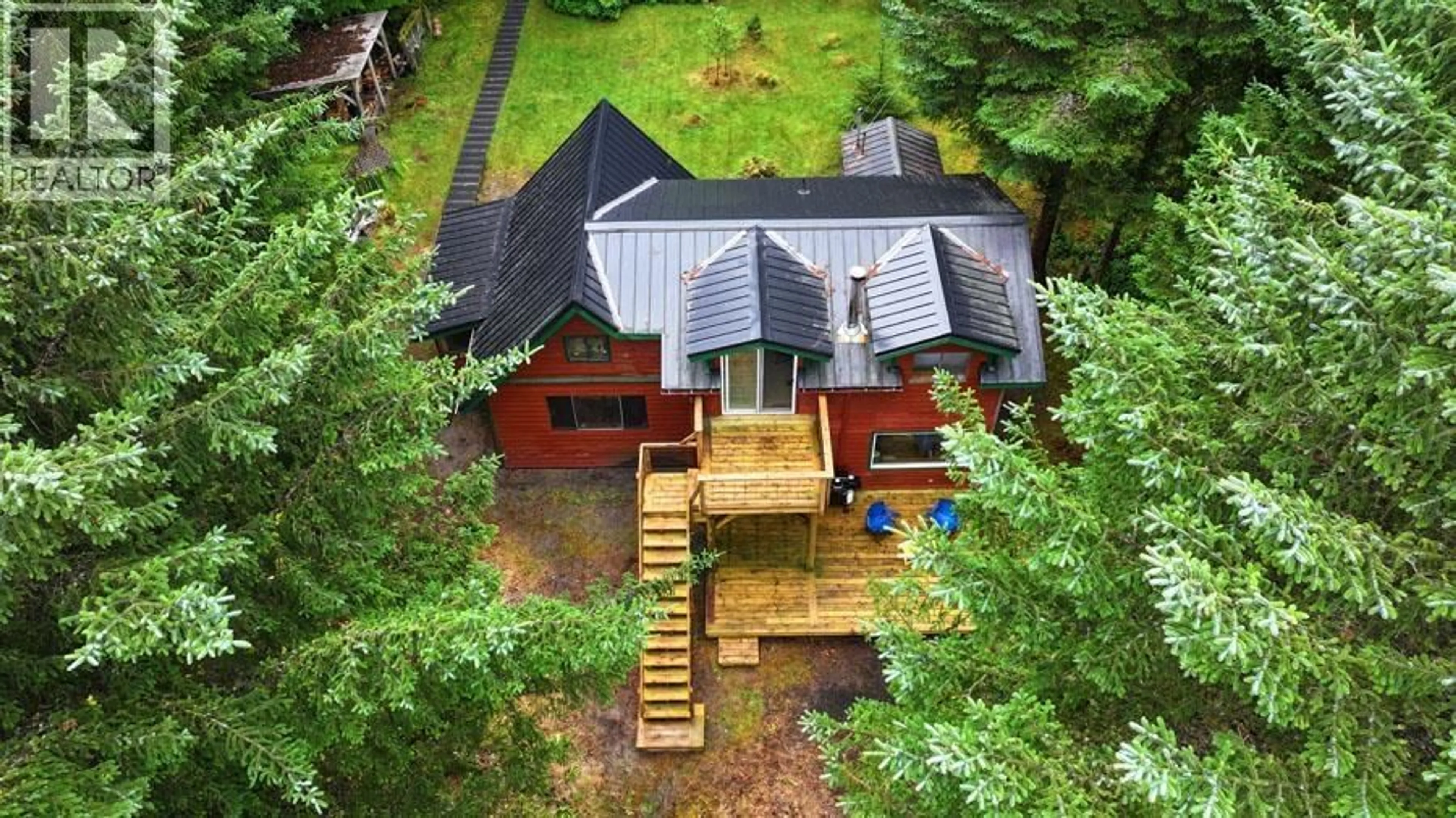A pic from outside/outdoor area/front of a property/back of a property/a pic from drone, forest/trees view for 12975 TOW HILL ROAD, Masset British Columbia V0T1M0