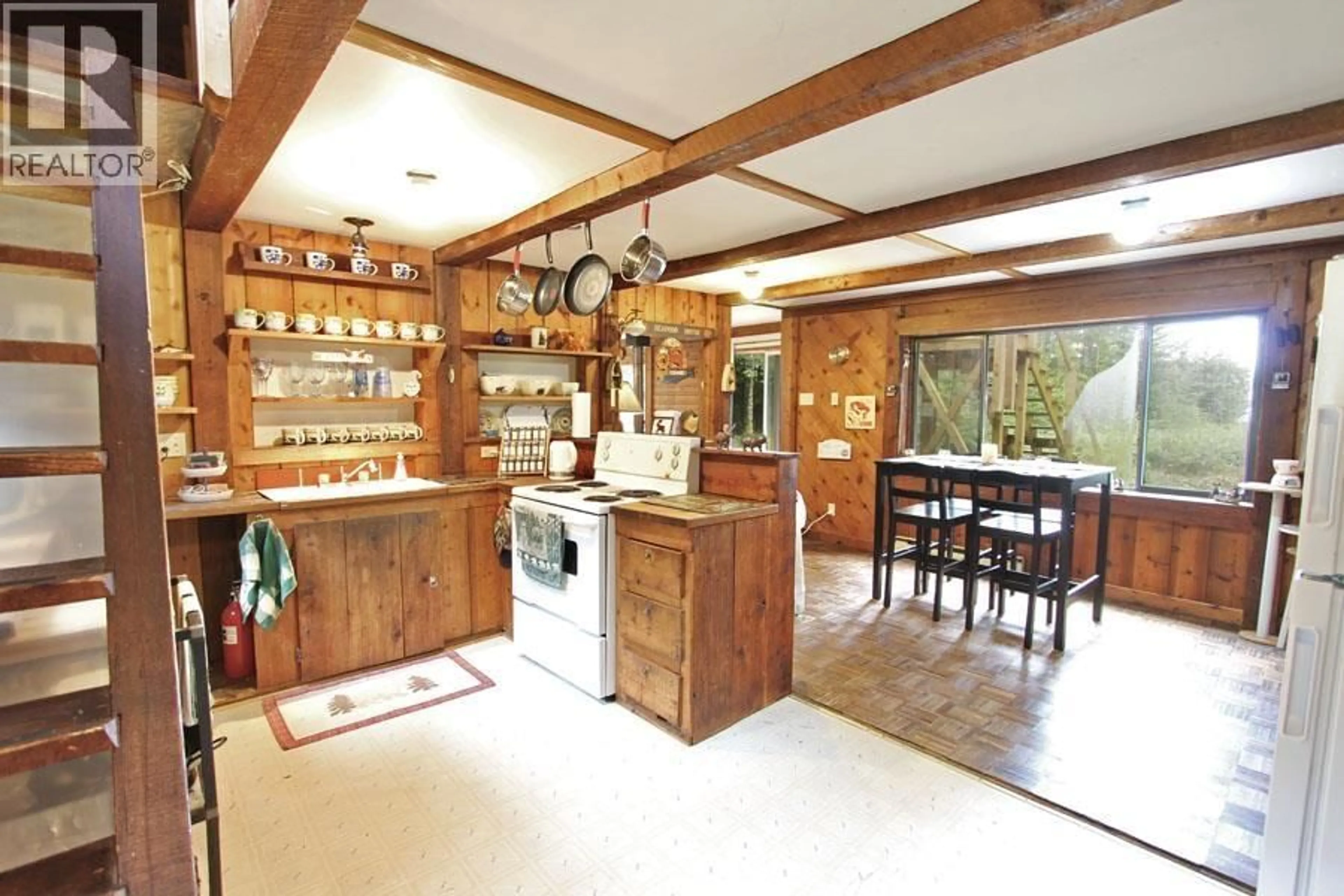 Rustic kitchen, ceramic/tile floor for 12975 TOW HILL ROAD, Masset British Columbia V0T1M0