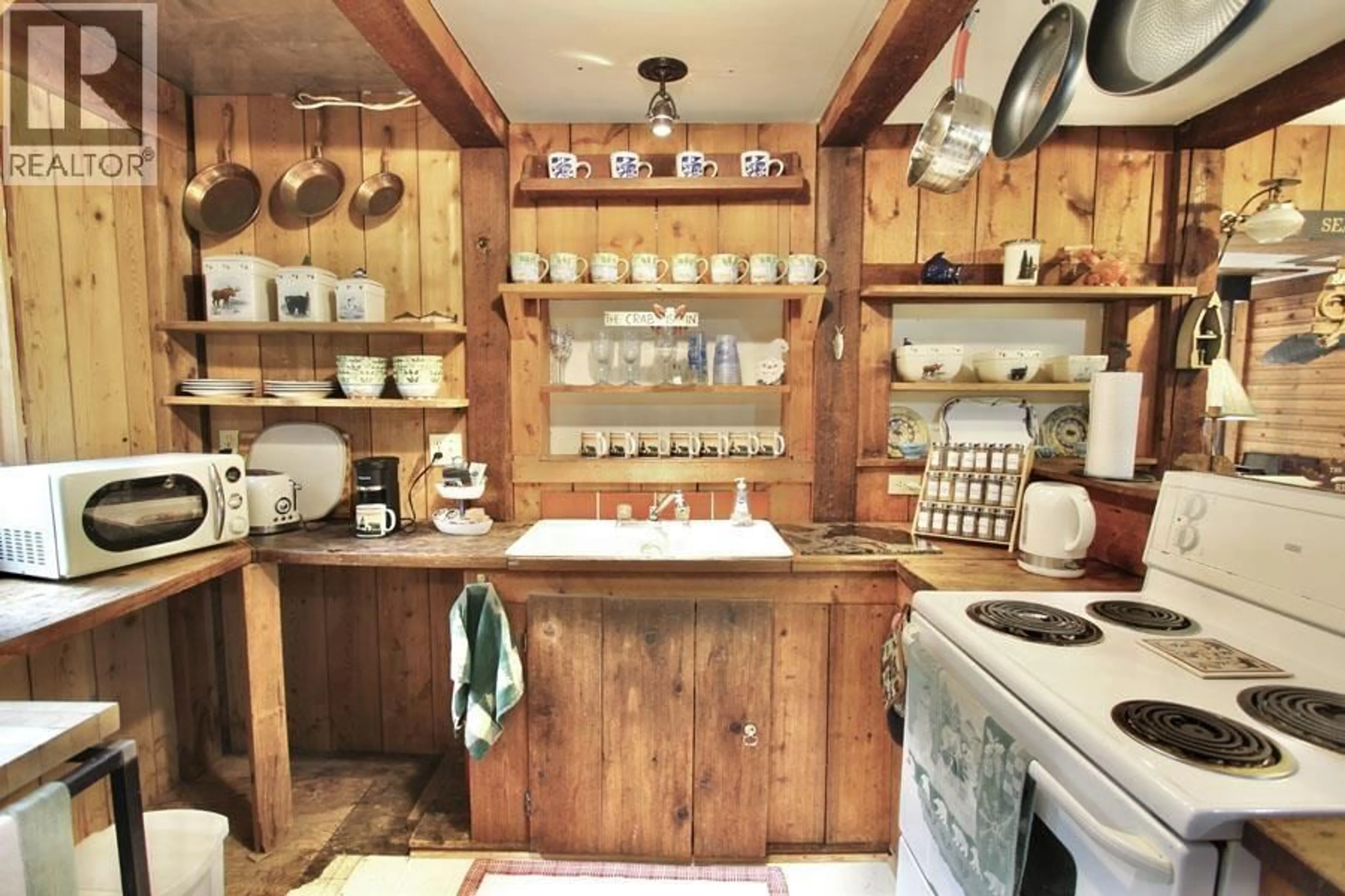Rustic kitchen, unknown for 12975 TOW HILL ROAD, Masset British Columbia V0T1M0