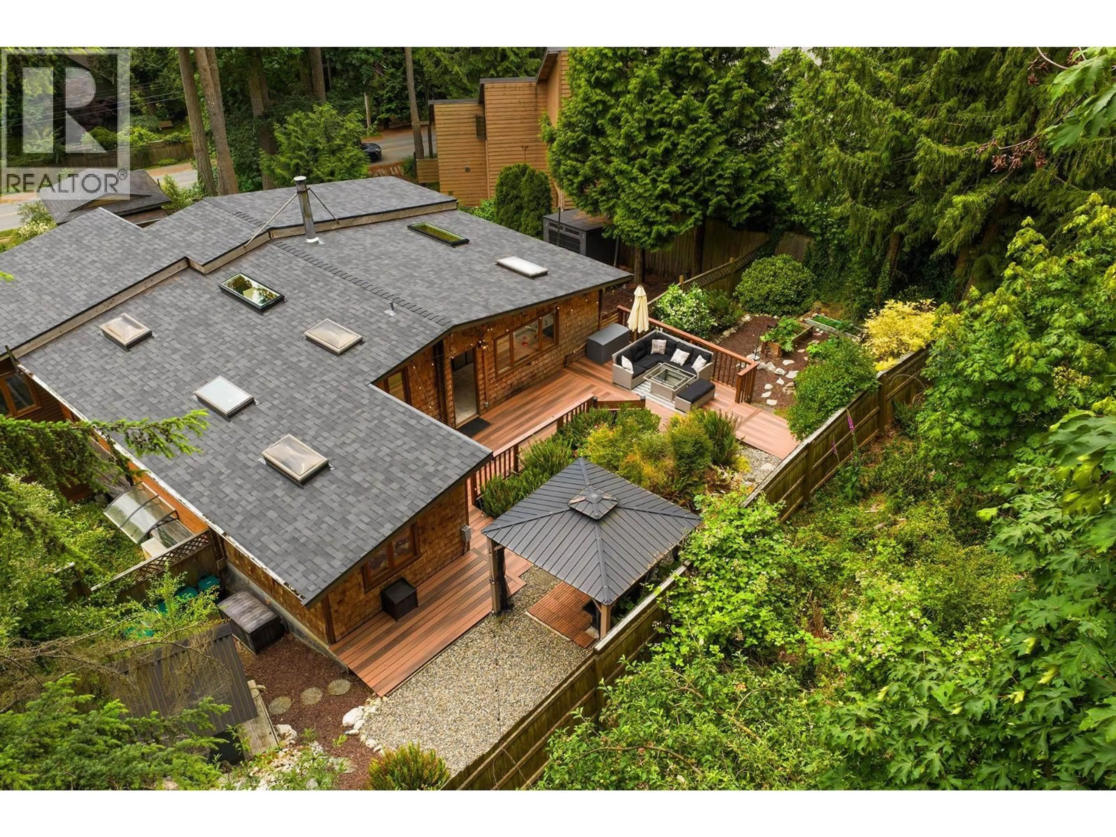 A pic from outside/outdoor area/front of a property/back of a property/a pic from drone, unknown for 1222 MILLER ROAD, Bowen Island British Columbia V0N1G1
