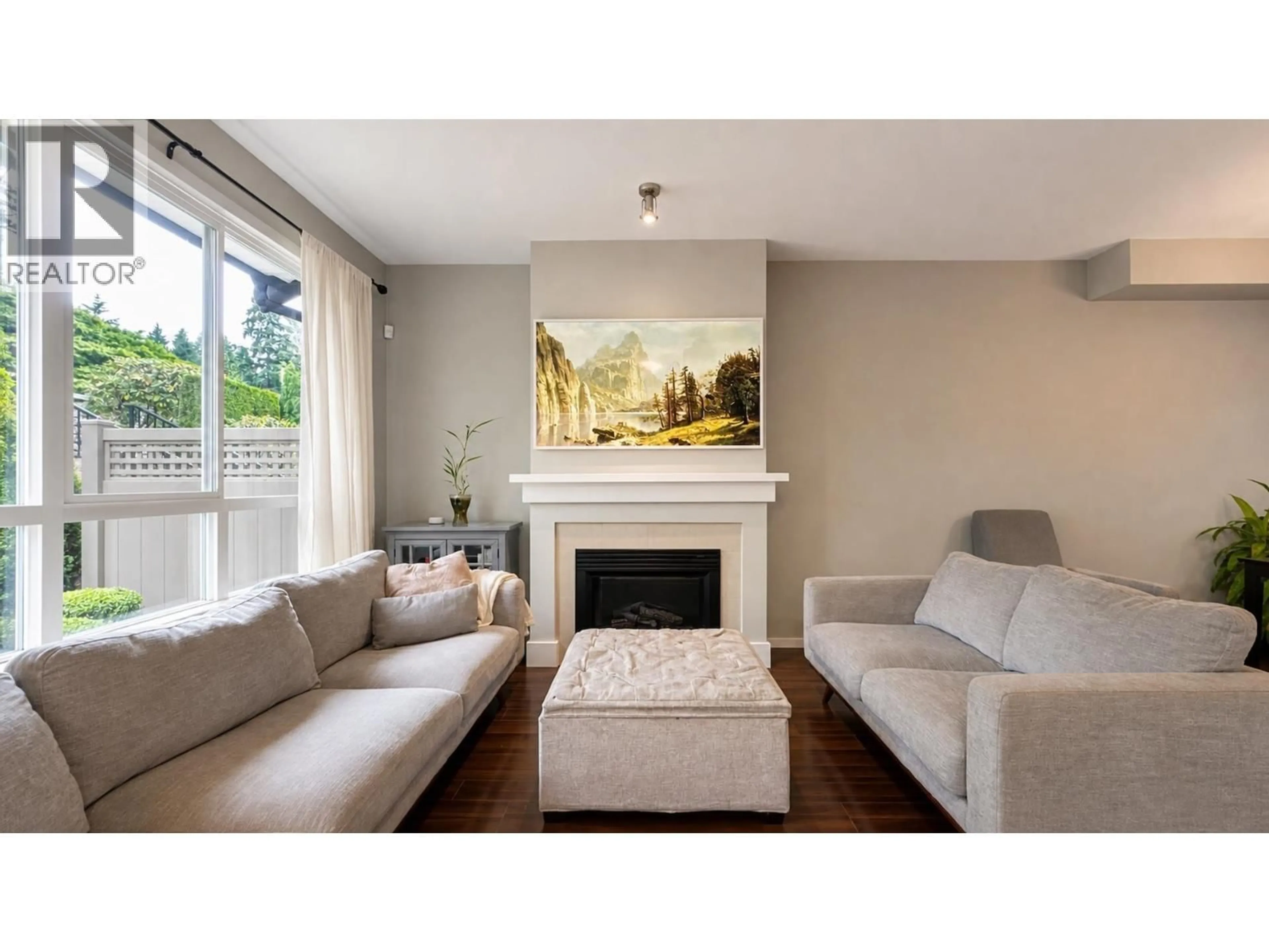 Living room with furniture, wood/laminate floor for 16 - 9088 HALSTON COURT, Burnaby British Columbia V3N0A7