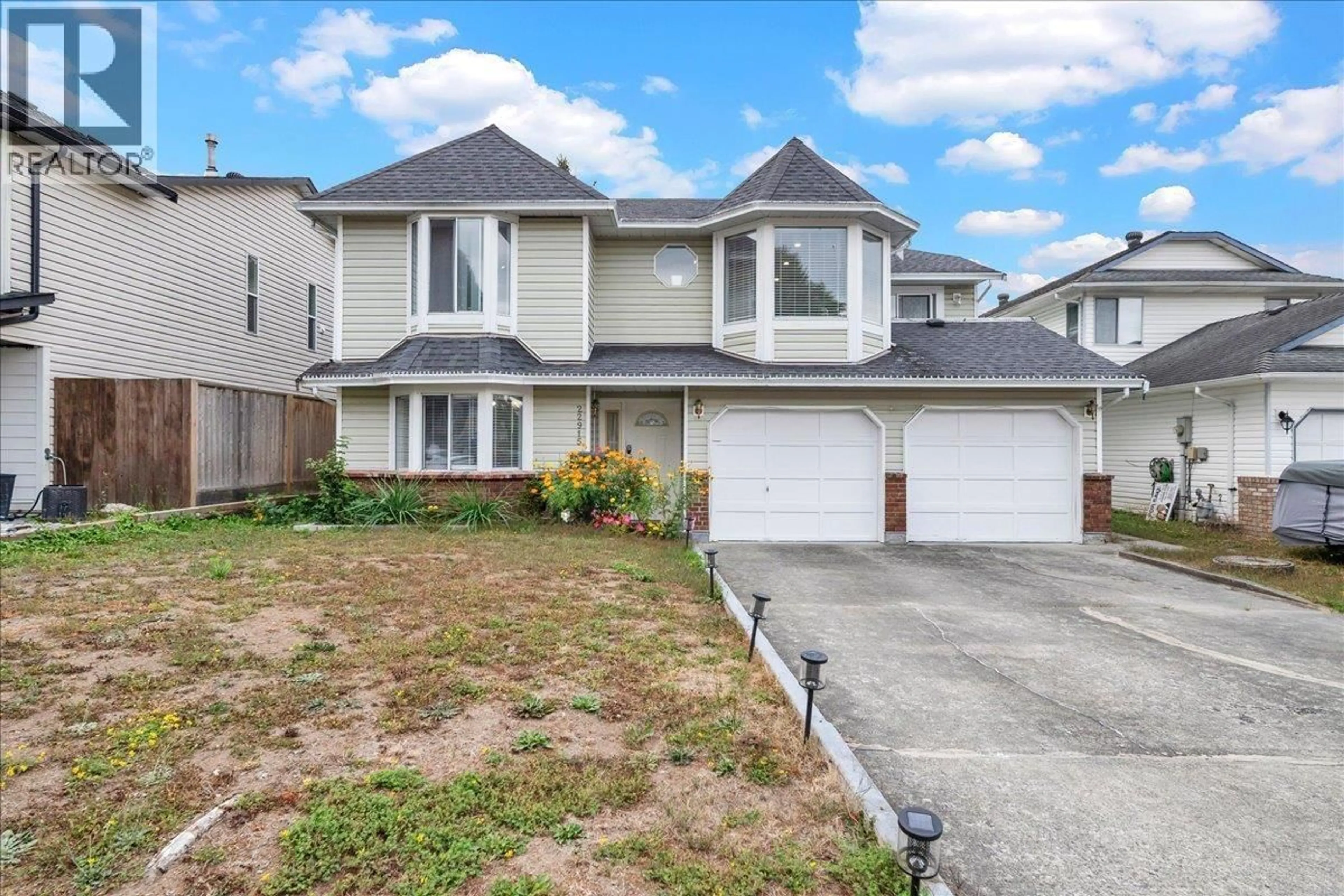 Home with vinyl exterior material, street for 22915 125A AVENUE, Maple Ridge British Columbia V2X0N3