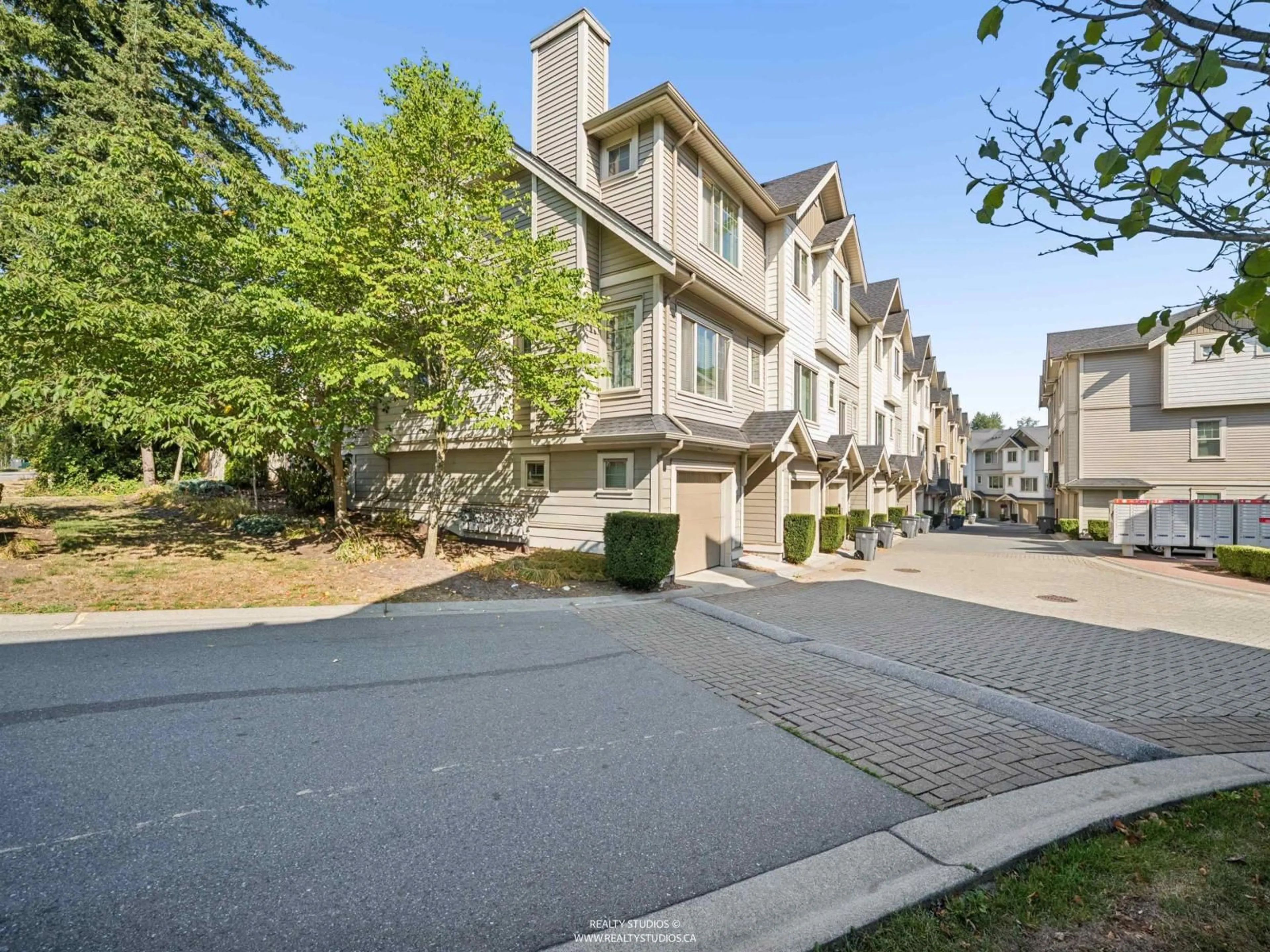 A pic from outside/outdoor area/front of a property/back of a property/a pic from drone, street for 76 - 19097 64 AVENUE, Surrey British Columbia V3S6X5