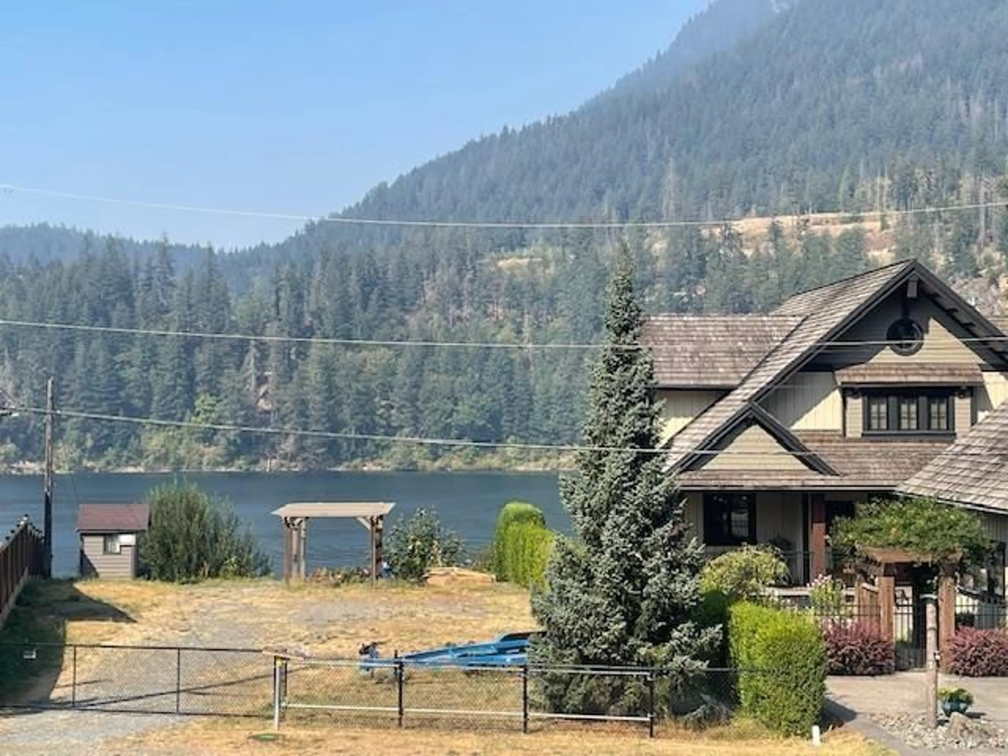 A pic from outside/outdoor area/front of a property/back of a property/a pic from drone, water/lake/river/ocean view for 21296 LAKEVIEW CRESCENT, Hope British Columbia V0X1L1