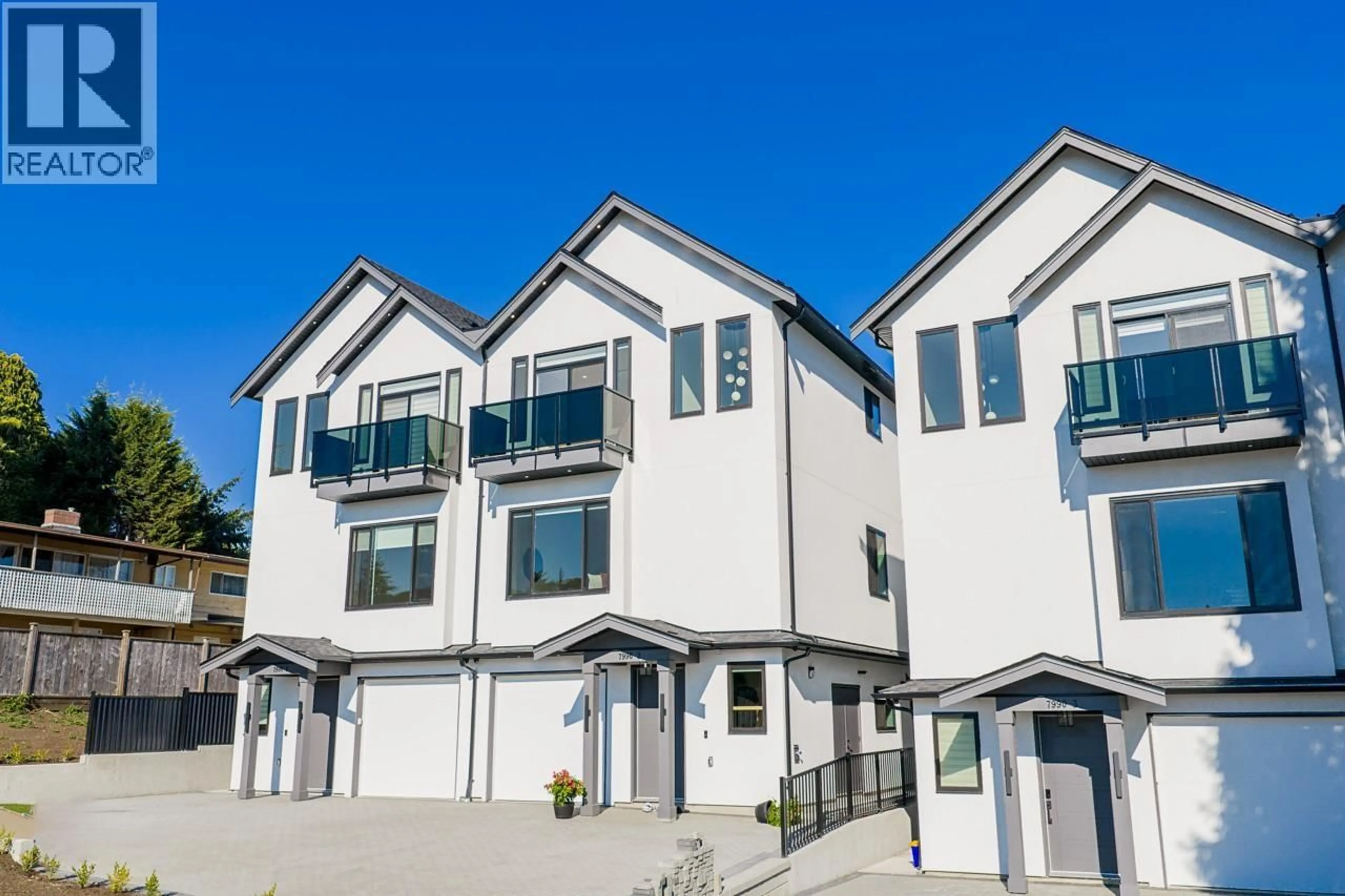 Home with vinyl exterior material, street for 2 - 7990 BRADLEY AVENUE, Burnaby British Columbia V5J0K5