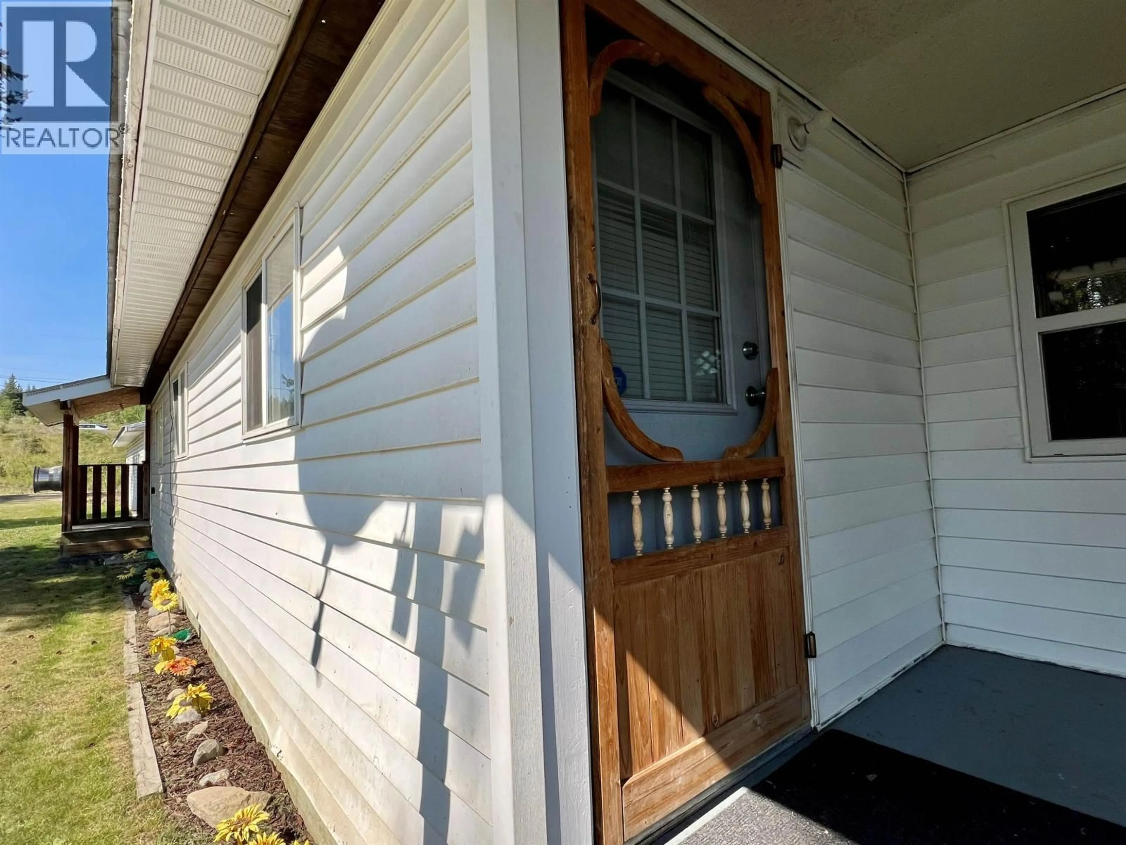 Home with vinyl exterior material, street for 5396 PARK DRIVE, 100 Mile House British Columbia V0K2E1
