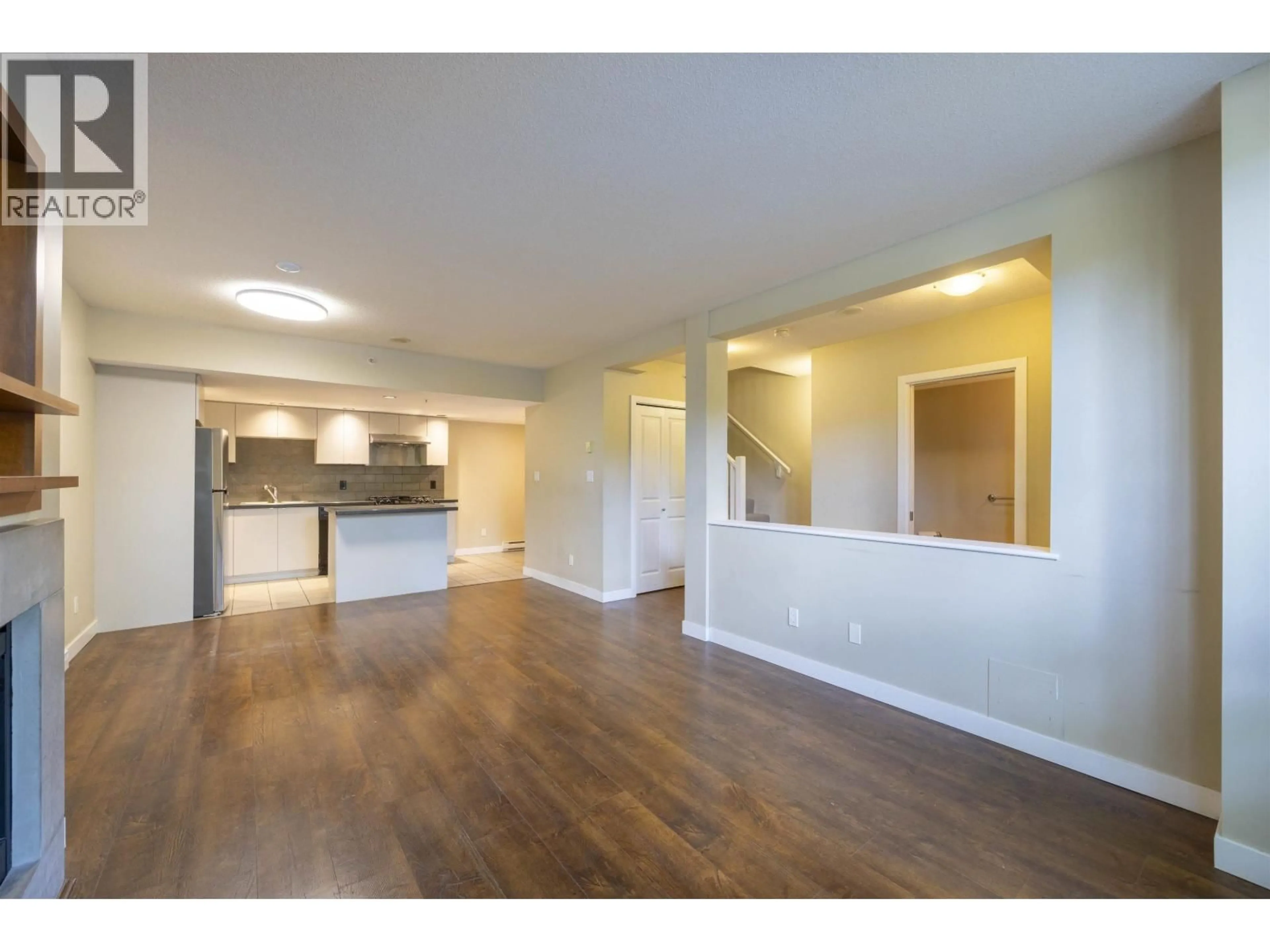 Open concept kitchen, wood/laminate floor for 3 - 6233 KATSURA STREET, Richmond British Columbia V6Y4K1