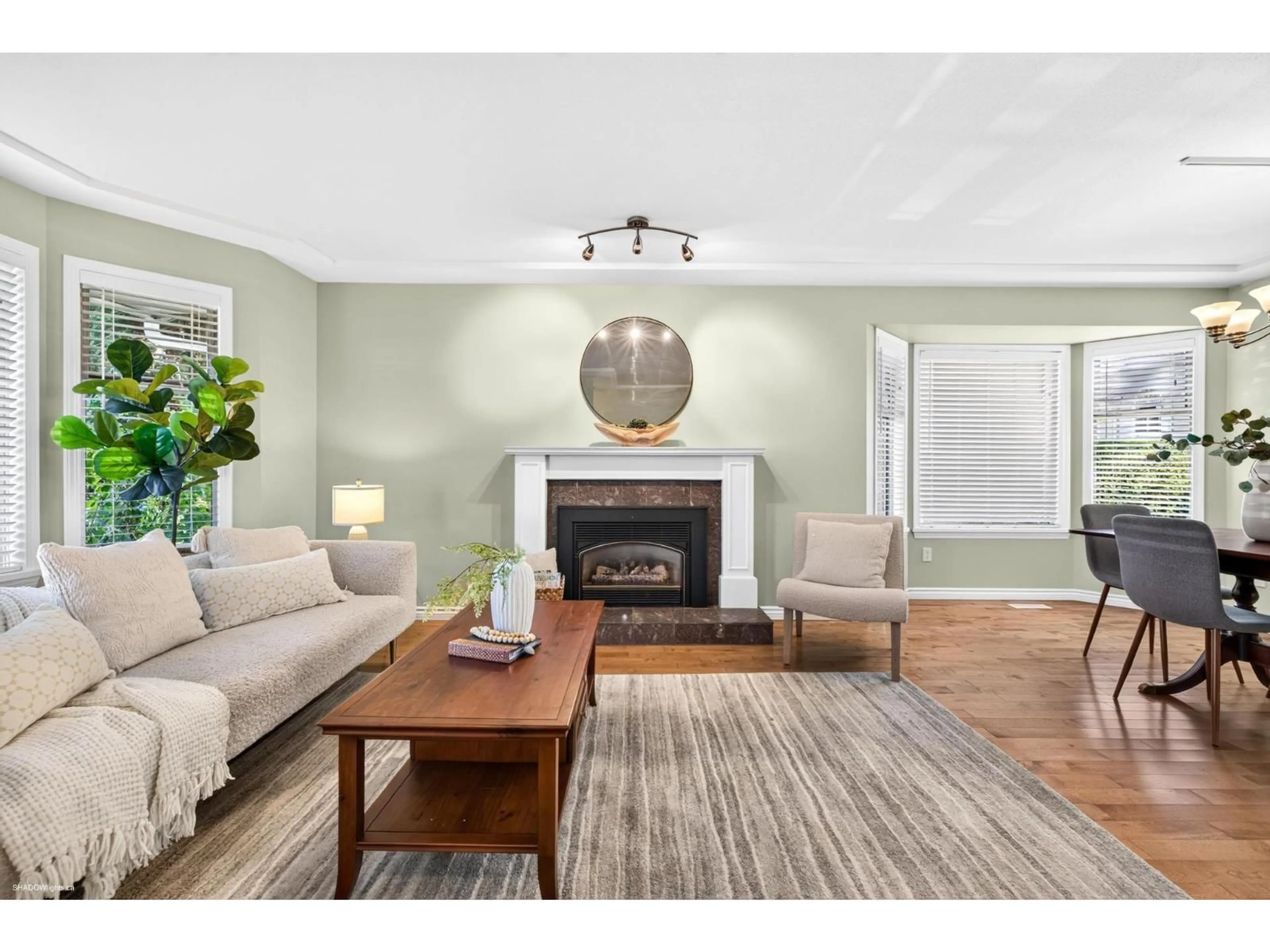 Living room with furniture, wood/laminate floor for 12074 BOUNDARY DRIVE SOUTH, Surrey British Columbia V3X2B4