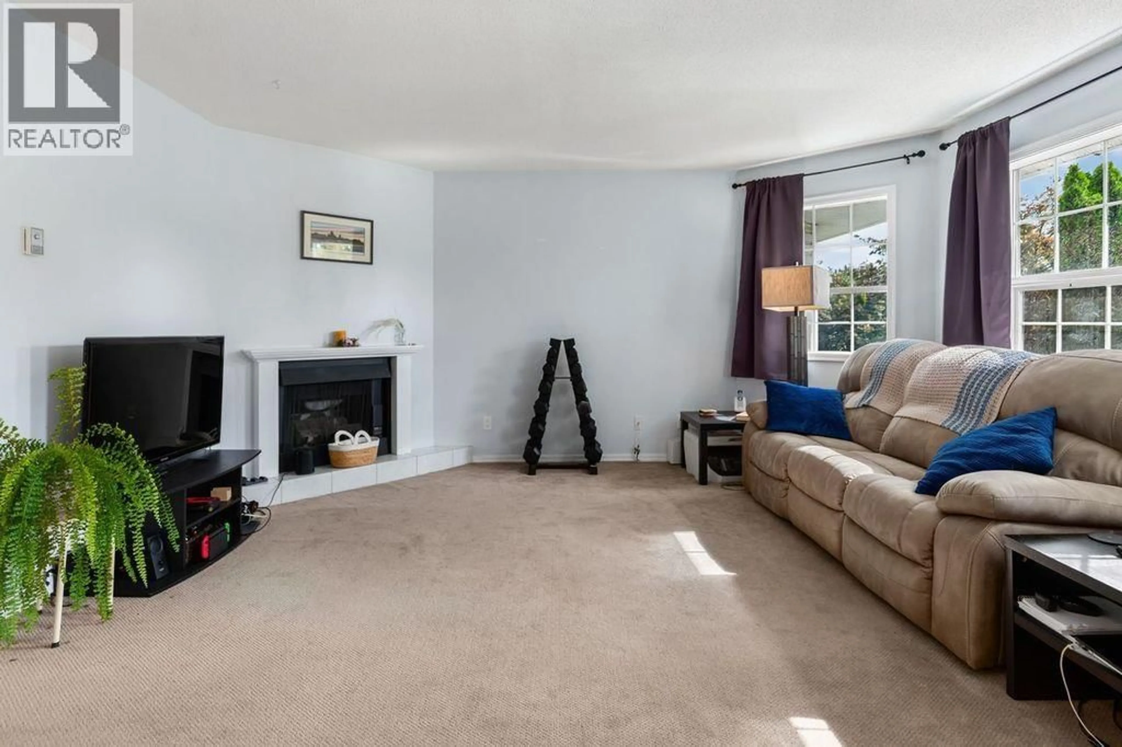 Living room with furniture, carpet floor for 205 - 106 MCDERMID DRIVE, Prince George British Columbia V2M4T6