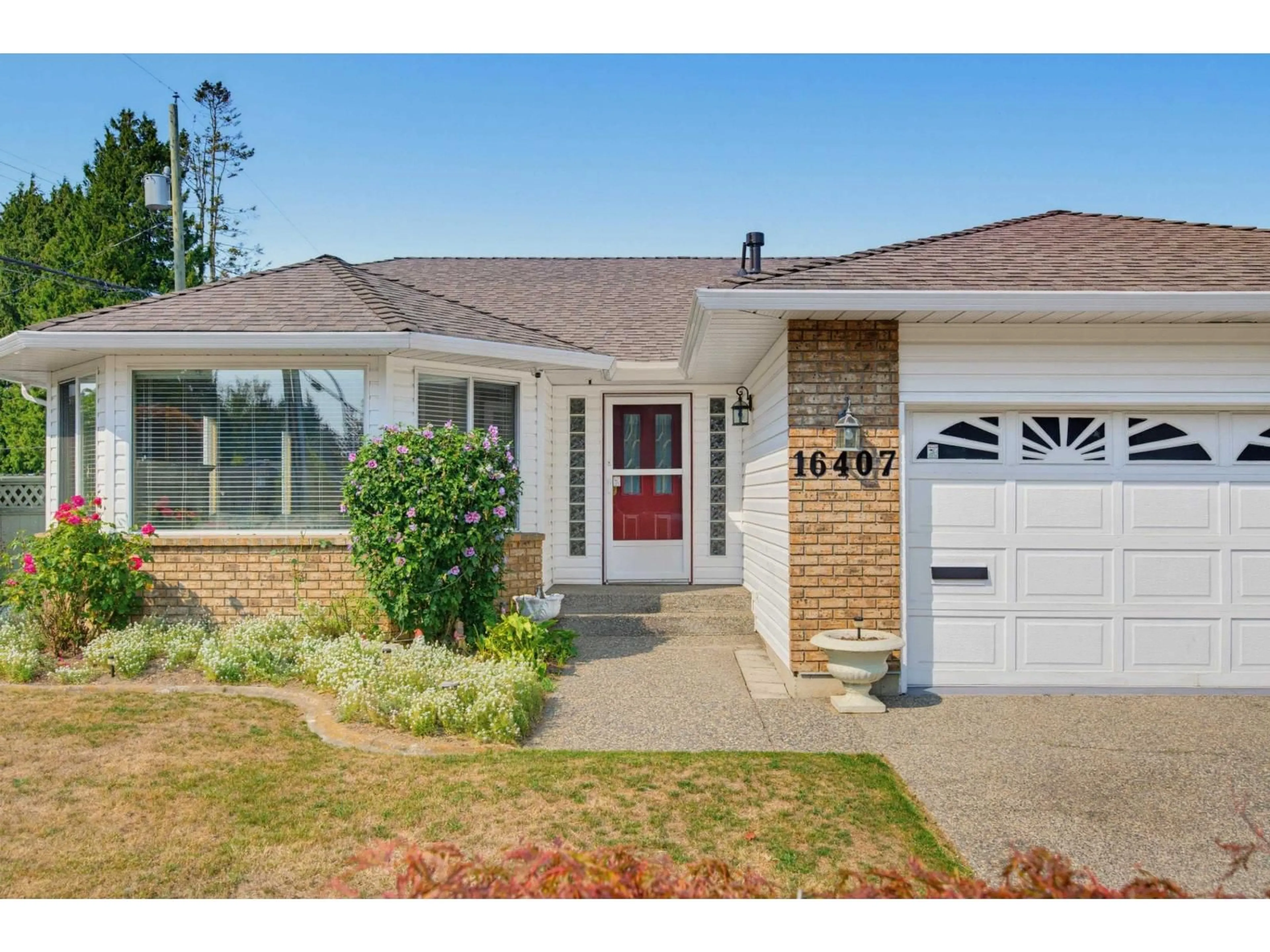 Home with vinyl exterior material, street for 16407 11A AVENUE, Surrey British Columbia V4A9G9