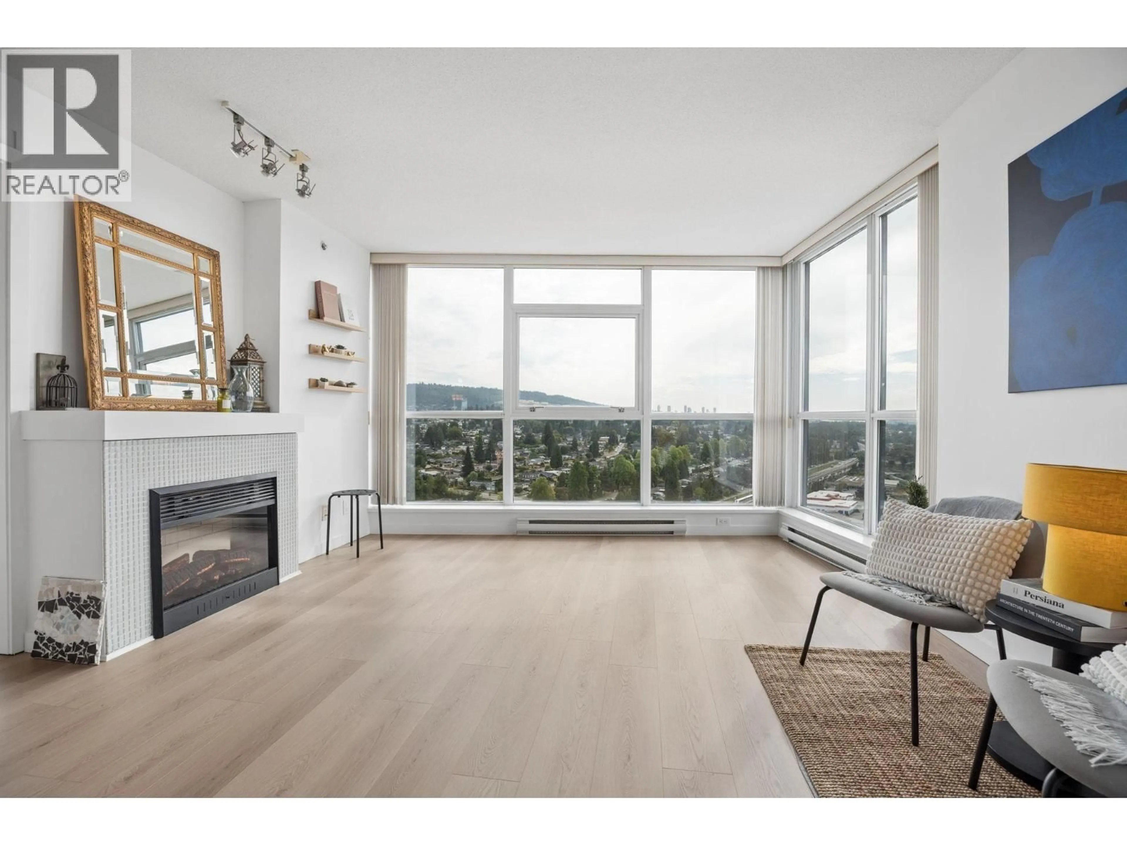 Living room with furniture, wood/laminate floor for 2602 - 2225 HOLDOM AVENUE, Burnaby British Columbia V5B0A1