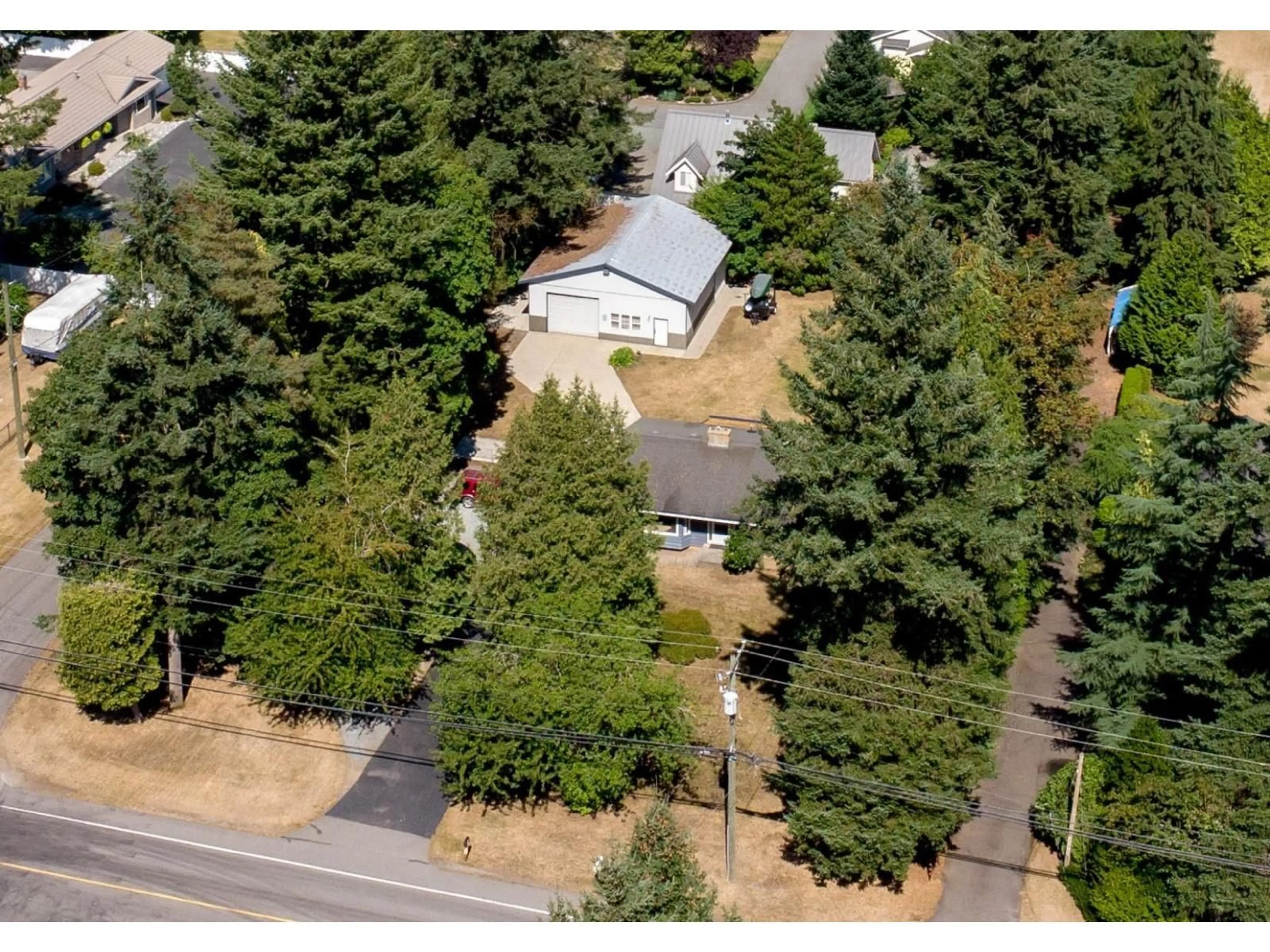 A pic from outside/outdoor area/front of a property/back of a property/a pic from drone, street for 23915 48TH AVENUE, Langley British Columbia V2Z2T1