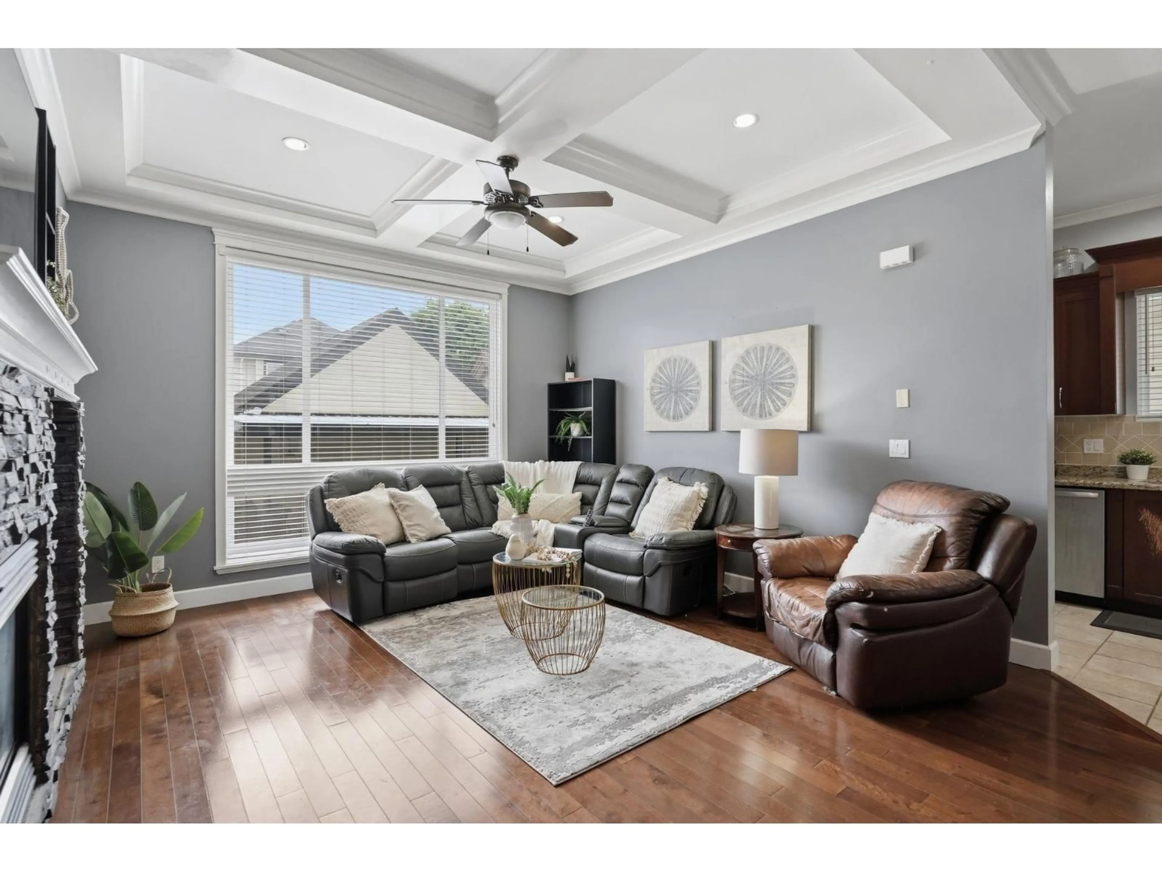 Living room with furniture, wood/laminate floor for 6814 192 STREET, Surrey British Columbia V4N0B5