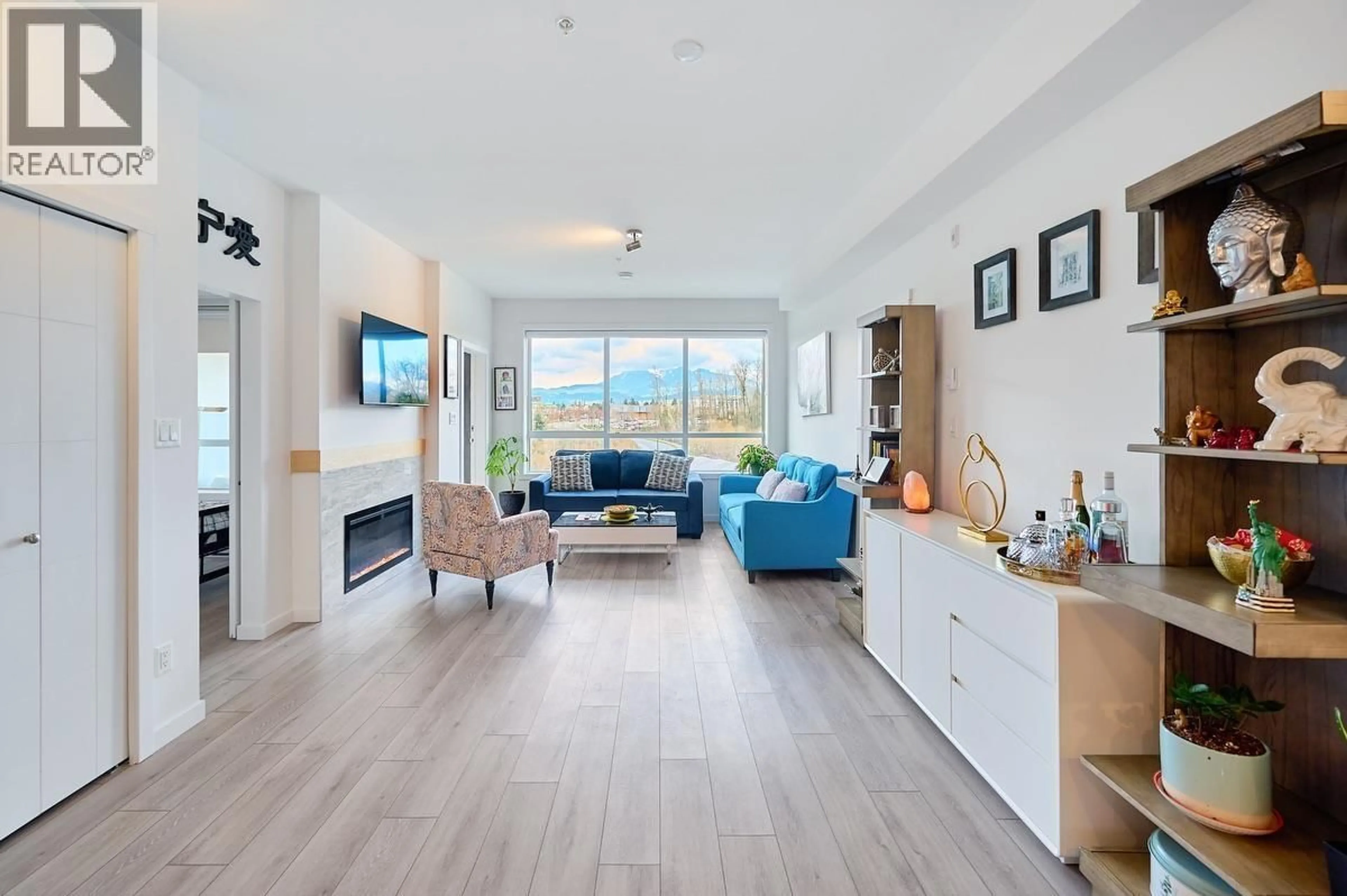 Living room with furniture, wood/laminate floor for 317 - 11641 227 STREET, Maple Ridge British Columbia V2X9J6