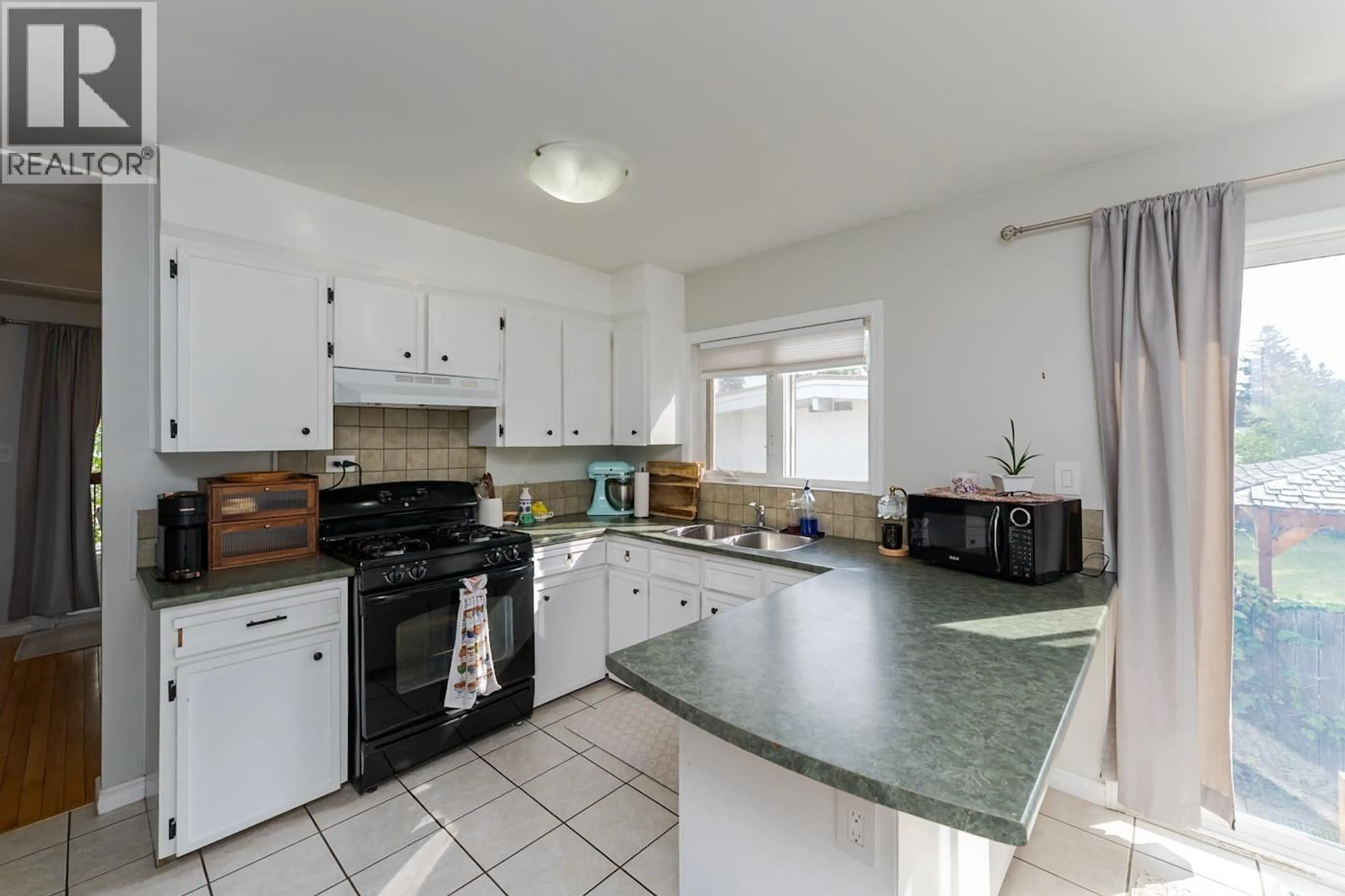Standard kitchen, ceramic/tile floor for 203 WATSON CRESCENT, Prince George British Columbia V2L4P4