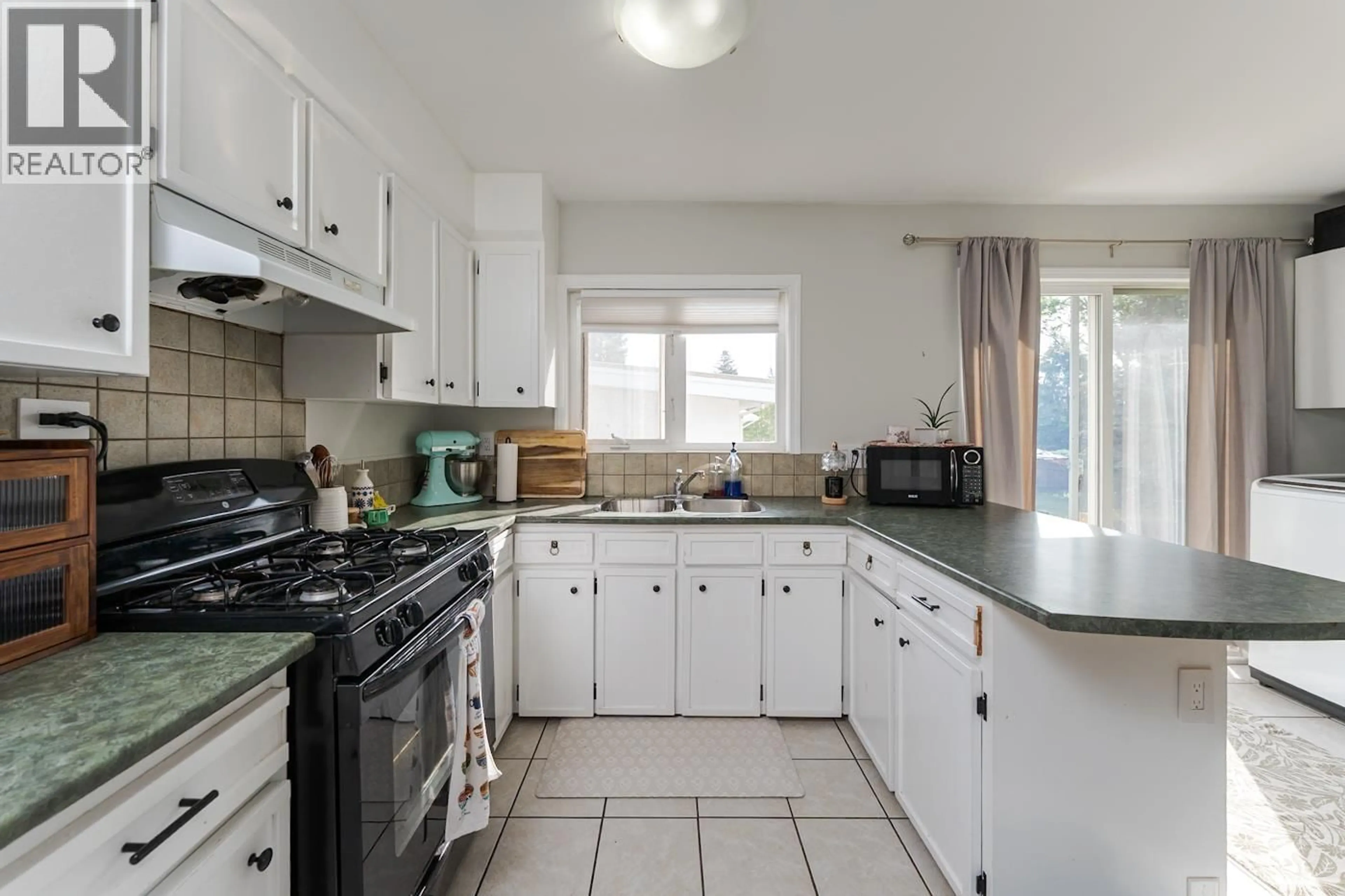 Standard kitchen, ceramic/tile floor for 203 WATSON CRESCENT, Prince George British Columbia V2L4P4