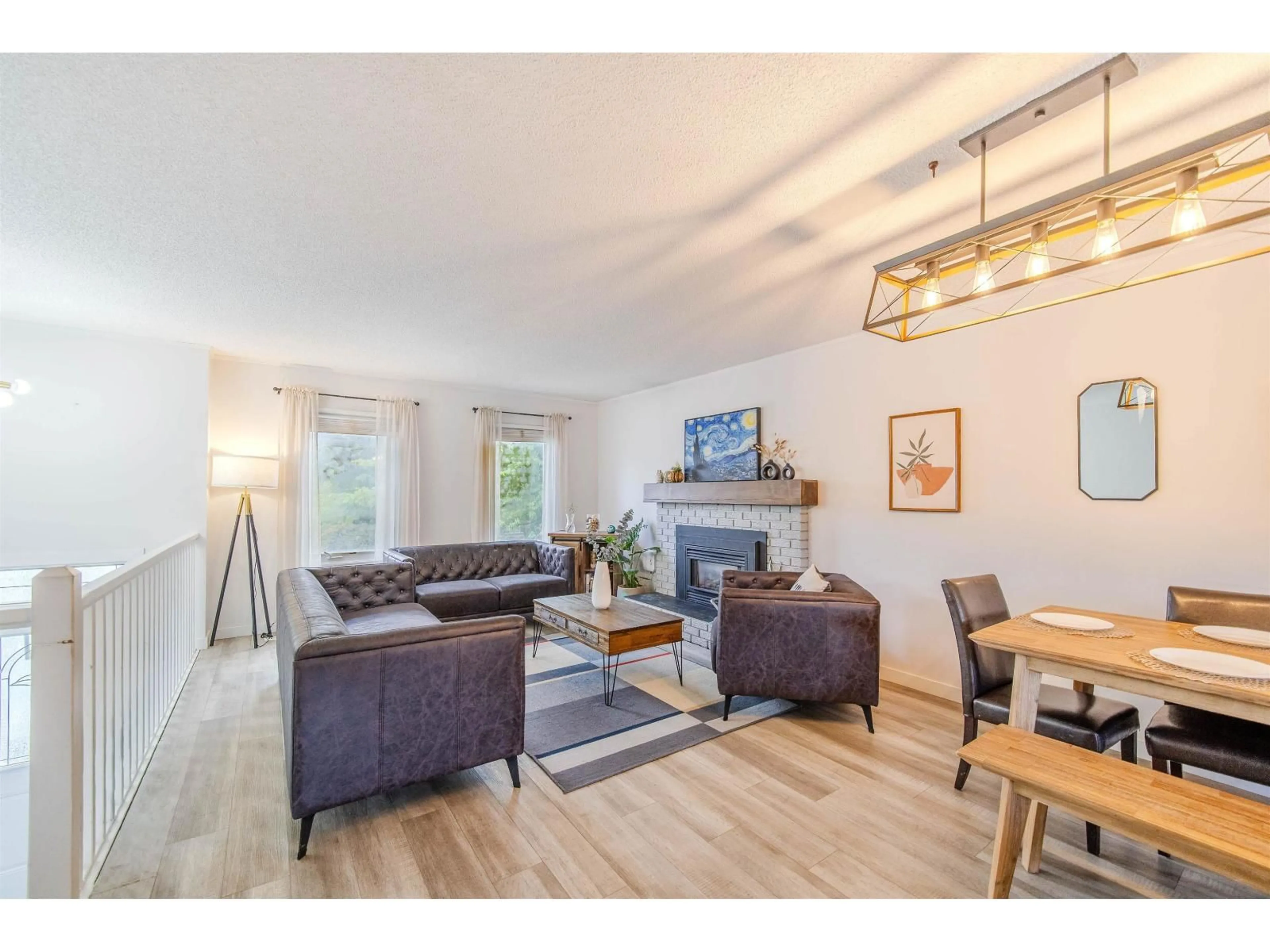 Living room with furniture, wood/laminate floor for 2659 WILDWOOD DRIVE, Langley British Columbia V2Y1G2