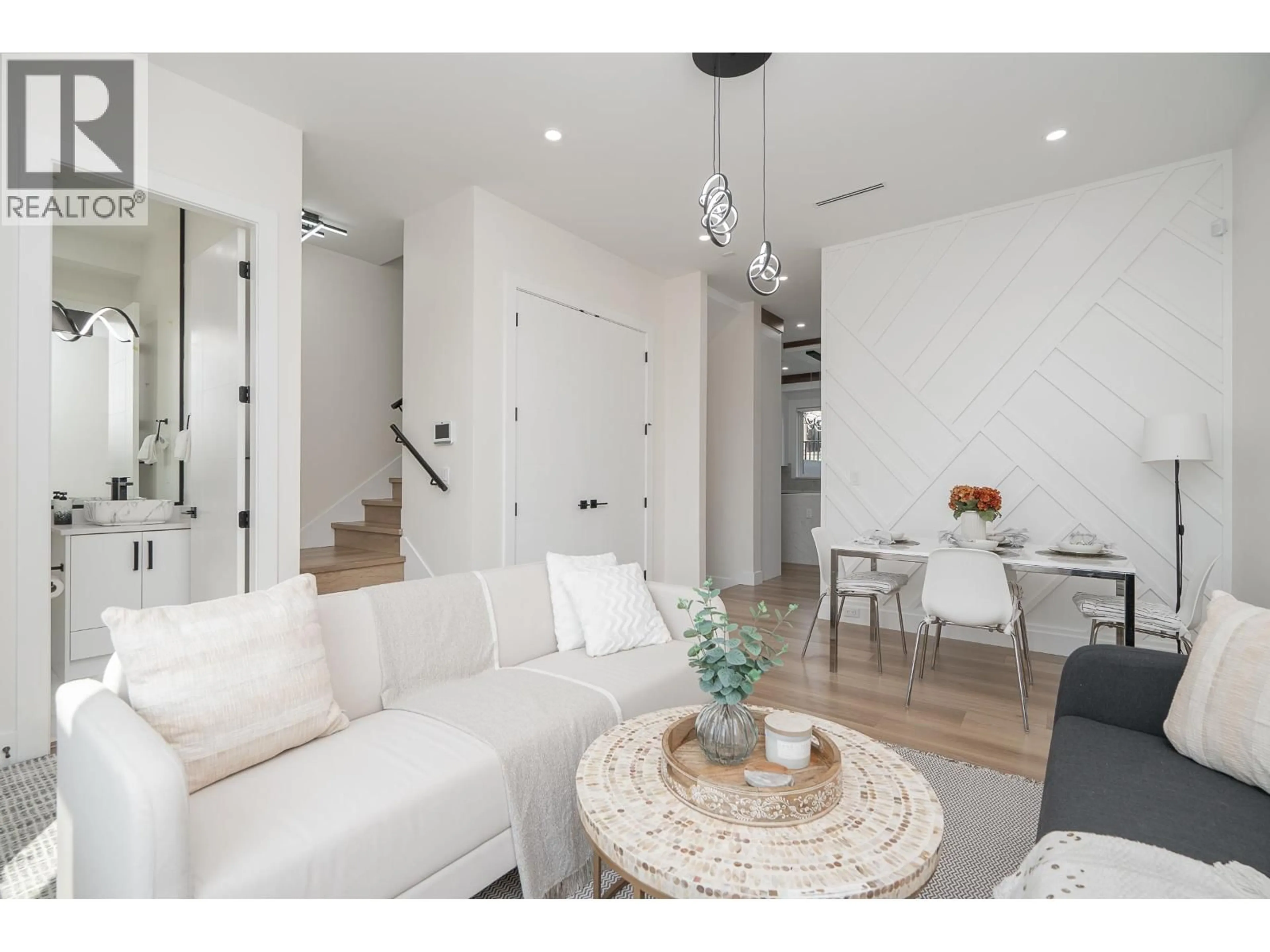 Living room with furniture, unknown for 102 - 1149 DANSEY AVENUE, Coquitlam British Columbia V3K3H5