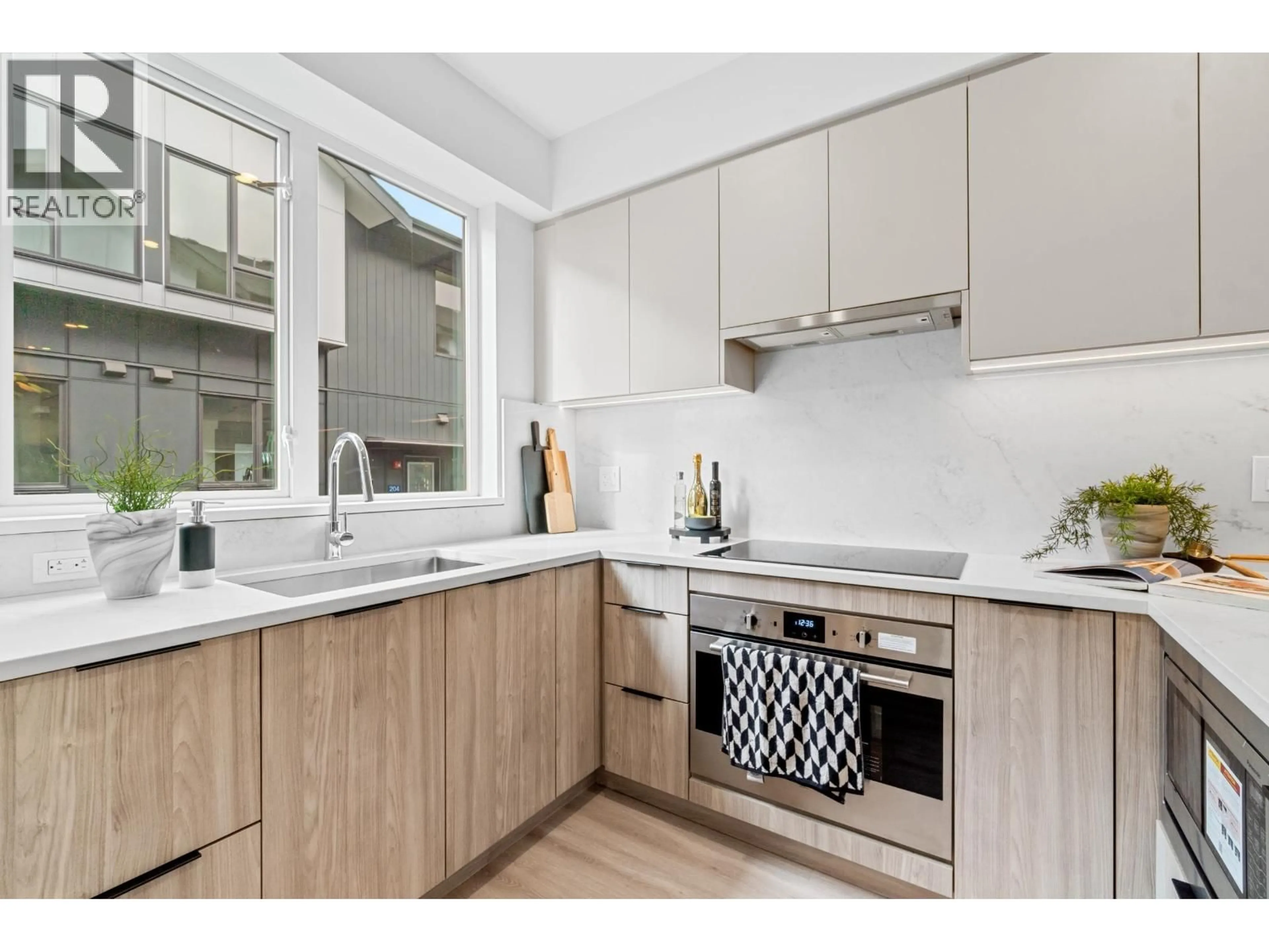 Standard kitchen, wood/laminate floor for 210 - 7161 17TH AVENUE, Burnaby British Columbia V3N0K1