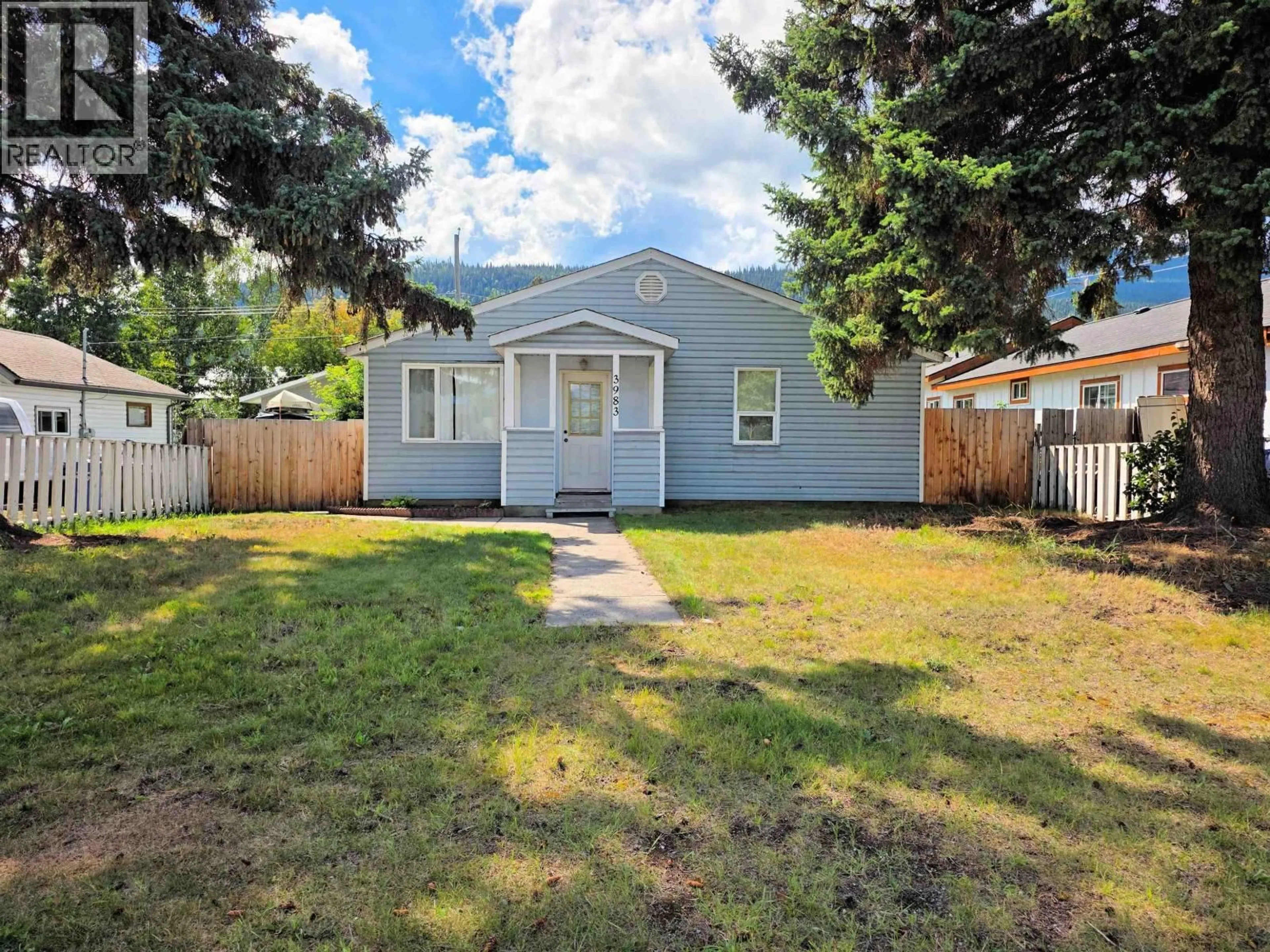 Home with vinyl exterior material, street for 3983 SECOND AVENUE, Smithers British Columbia V0J2N0